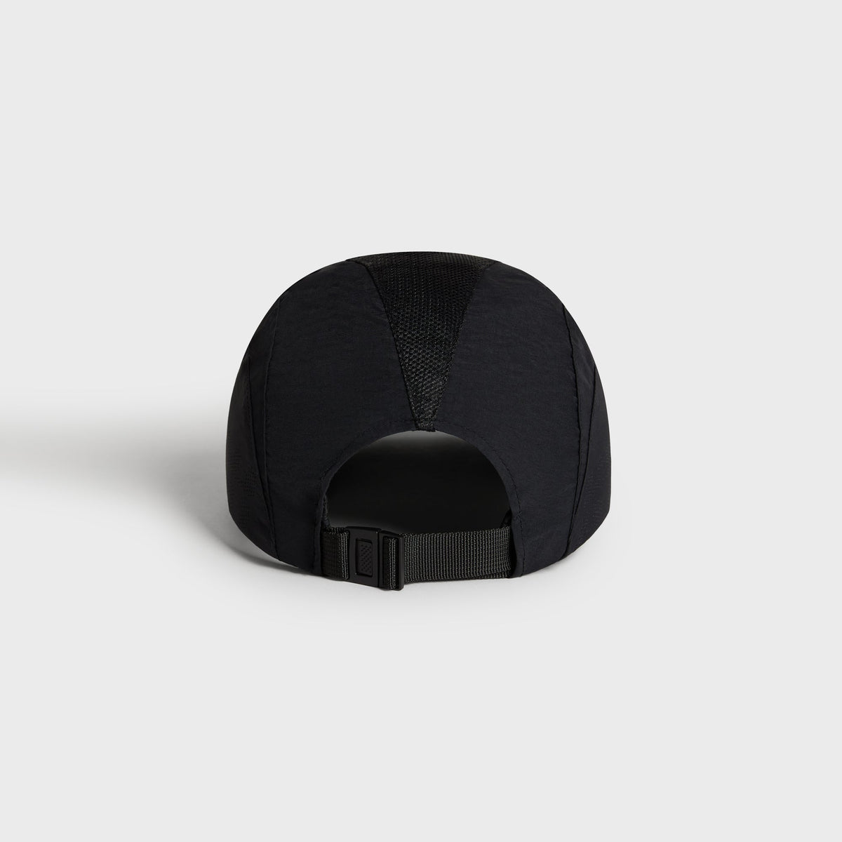 Kith Nylon Mesh Paneled Griffey Camper Hat in black, rear view showing open back panel