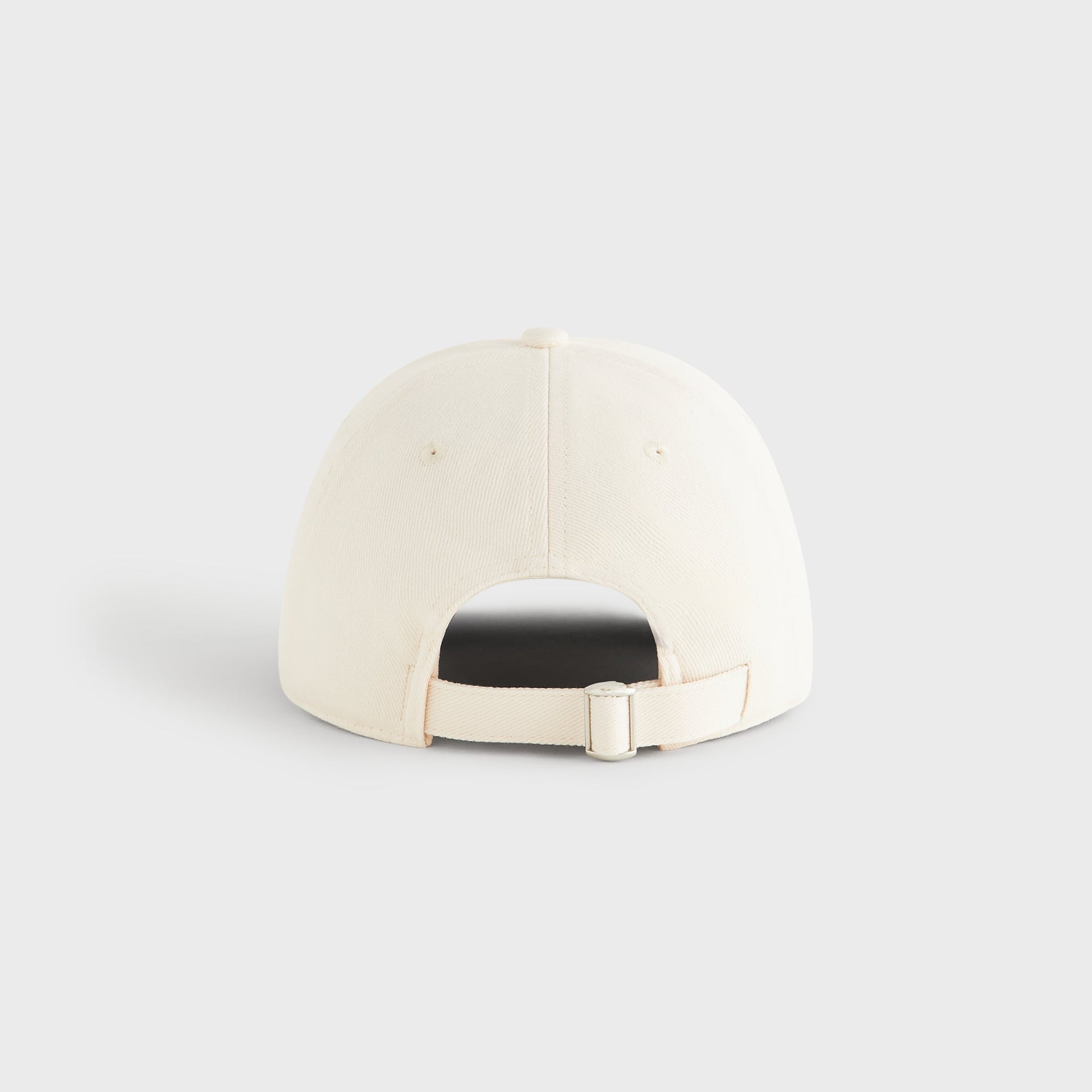 Kith Script Brushed Twill Bay Low Pinch Crown Cap in Nocturnal, back view showing ivory strap and buckle