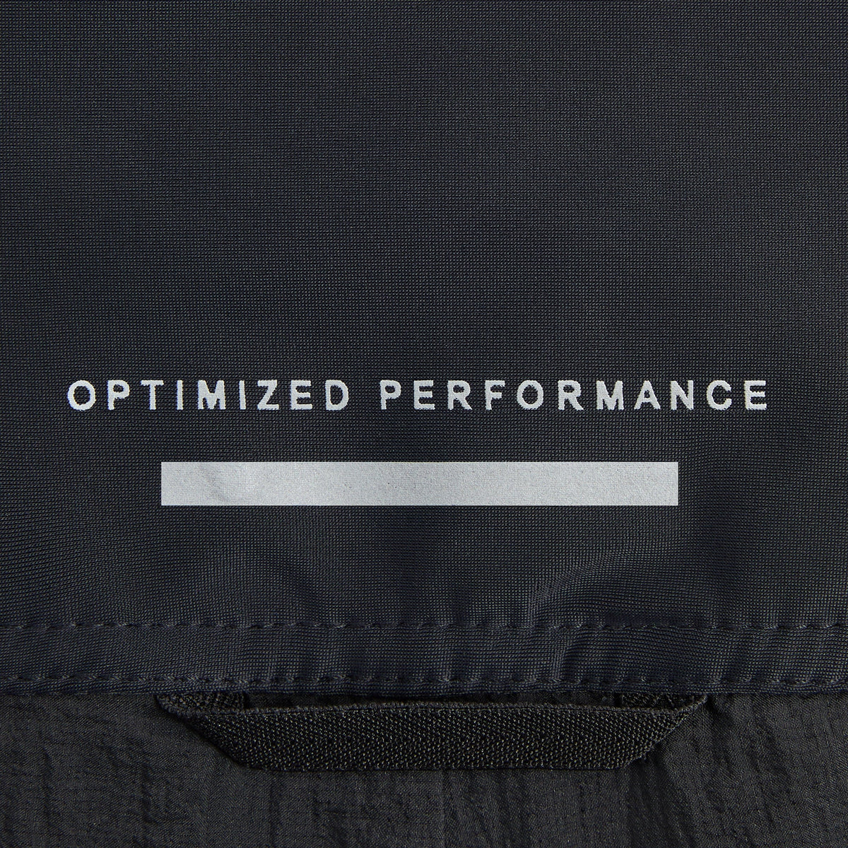Close-up of Kith Ceres 3-inch Short dolphin hem detail