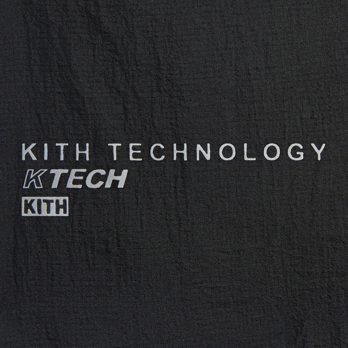 Close-up of Kith Ceres 3-inch Short vertical KTECH wordmark on the thigh