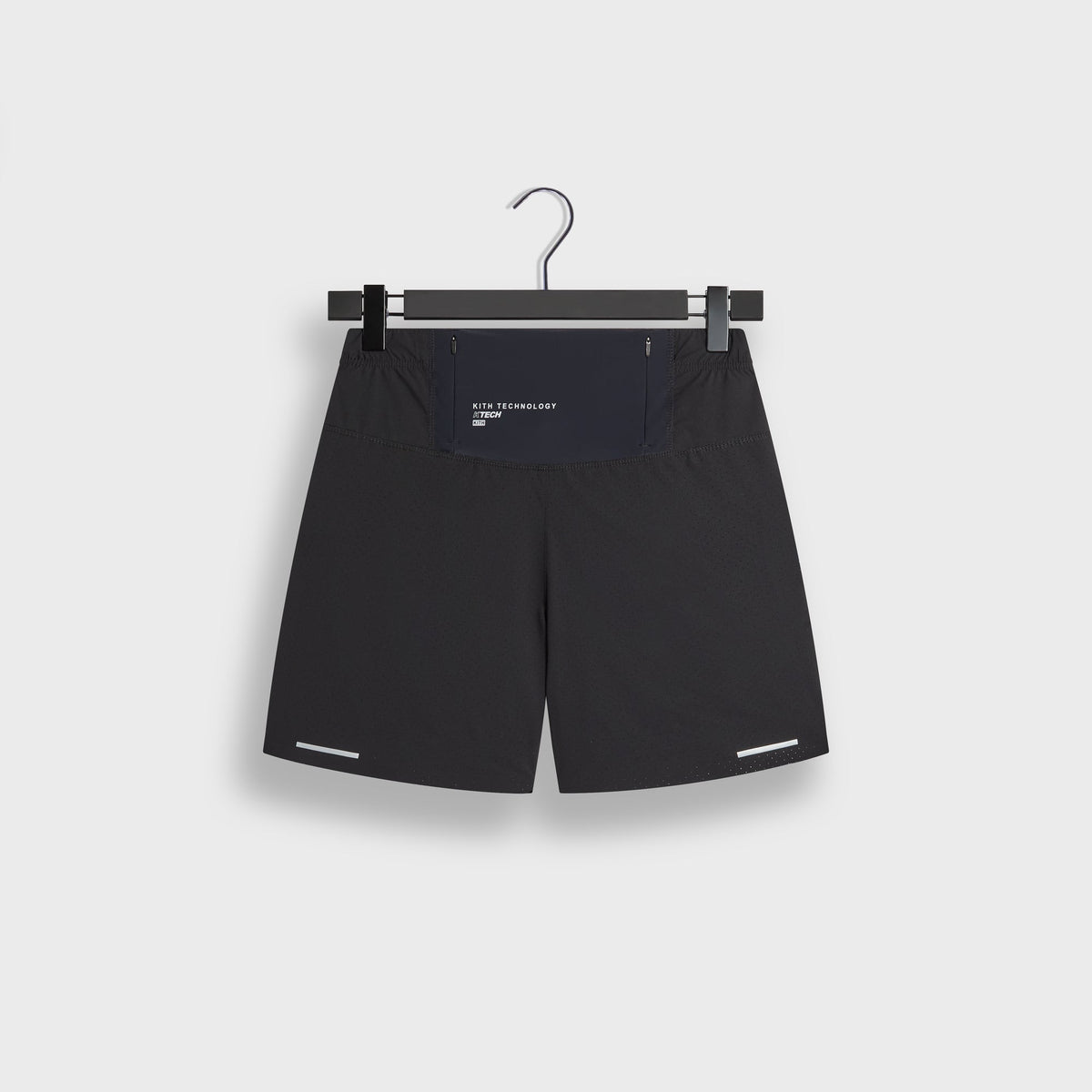 Kith Demas 5-inch Short in black, flat lay back view showing elastic waistband