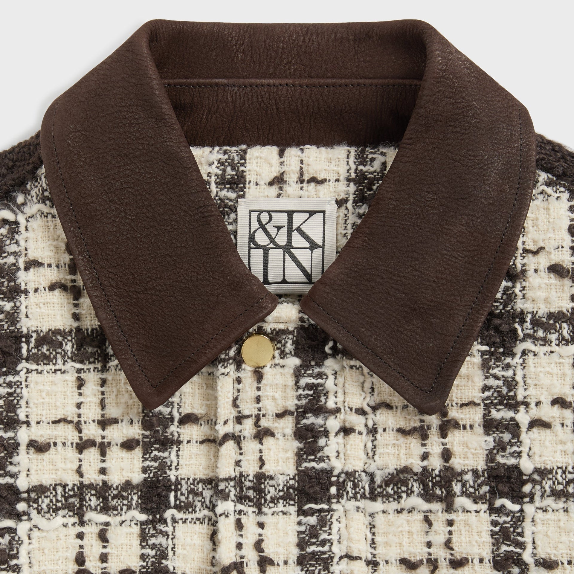 &Kin Hawthorne Flight Jacket detail: brown leather point collar with gold snap and &Kin label