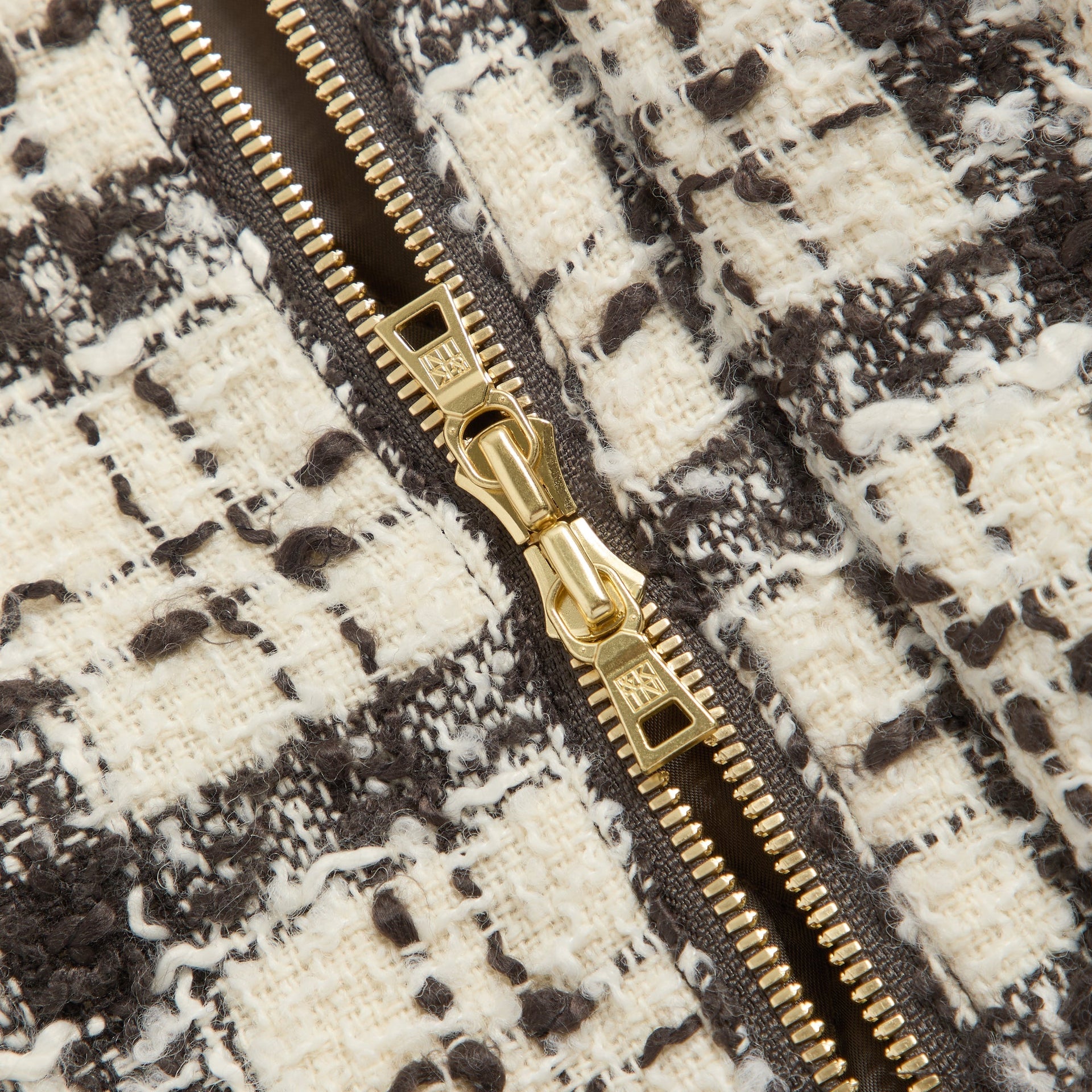 &Kin Hawthorne Flight Jacket detail: gold two-way zip pulls engraved &Kin on check tweed