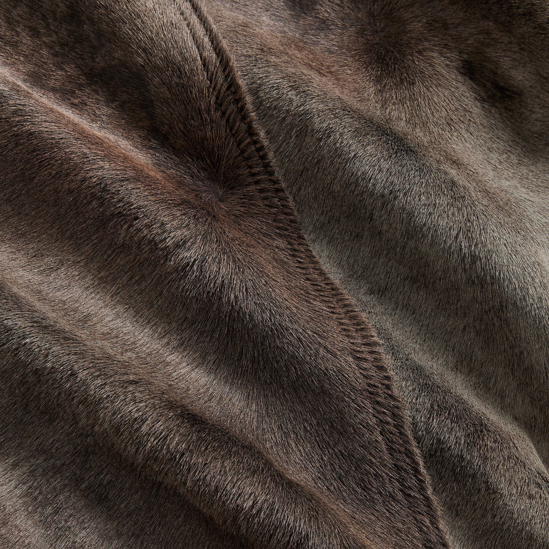 Close-up of Underground mottled brown pony hair of the &Kin Cassius Moto Jacket