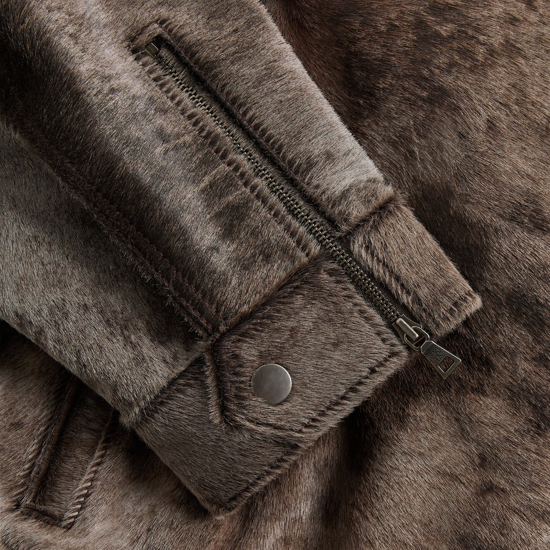 &Kin Cassius Moto Jacket detail: zip and snap-flap closure on mottled brown pony hair