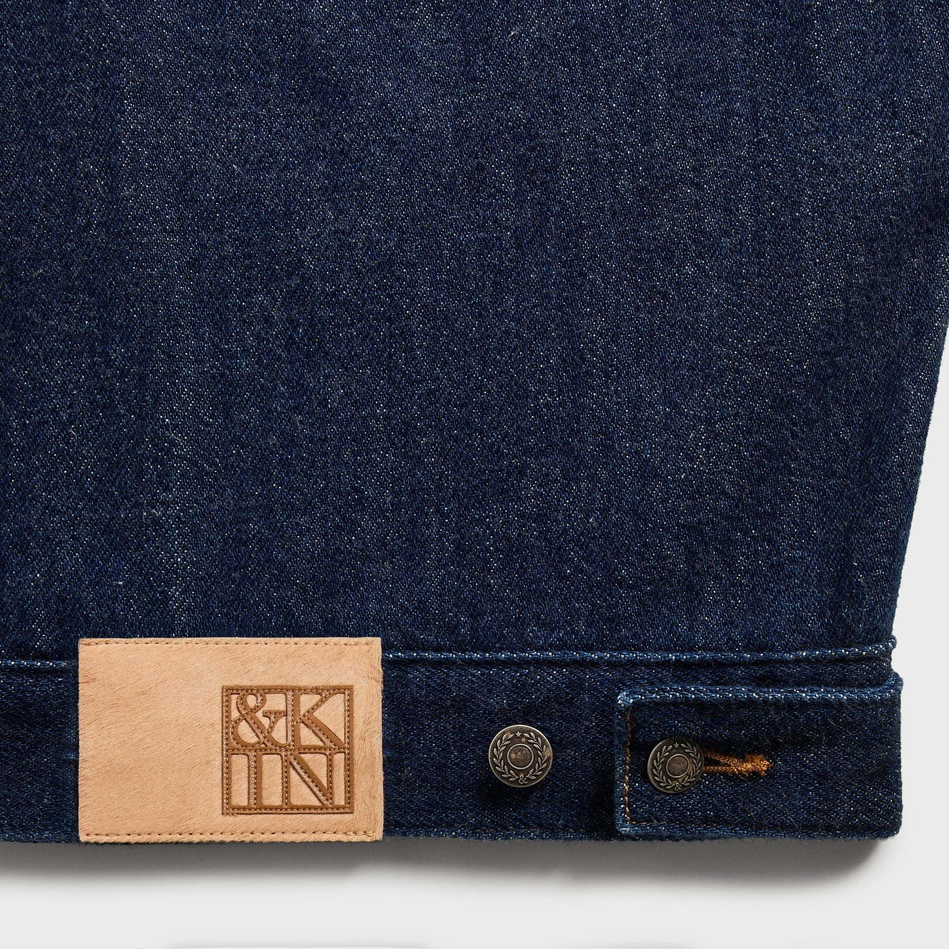 &Kin Rope Twill Alonzo Jacket hem detail, leather &Kin patch and metal waist adjuster buttons