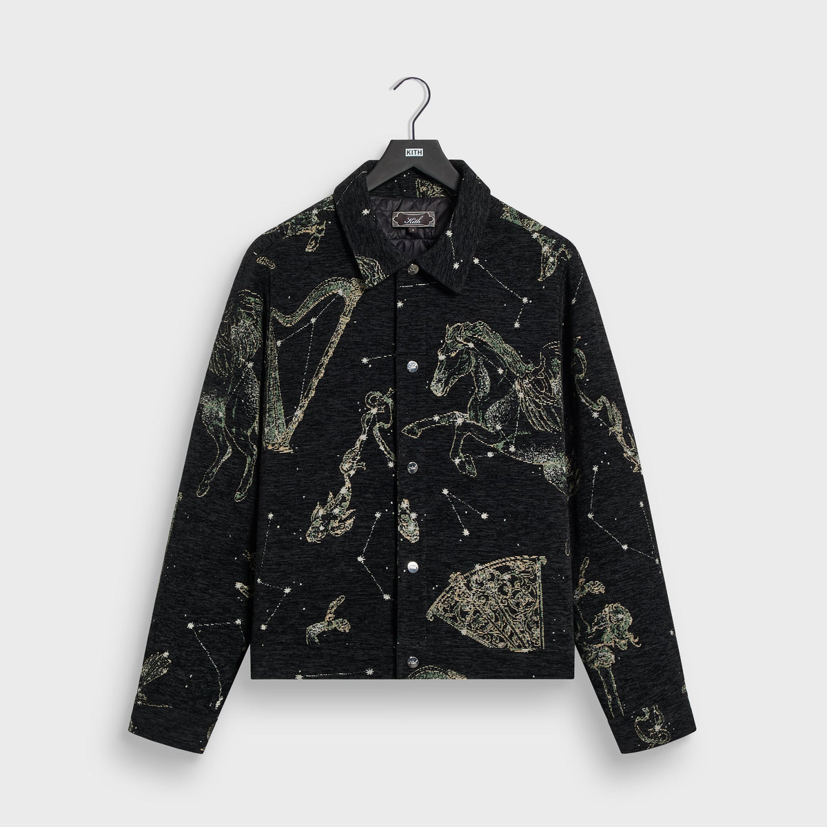 Kith Chenille Tapestry Helios Jacket in black with gold and green celestial constellation tapestry, front view