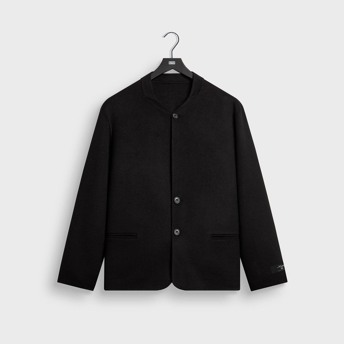 Kith Double-Face Wool Wes Jacket in black, front view, collarless three-button wool jacket