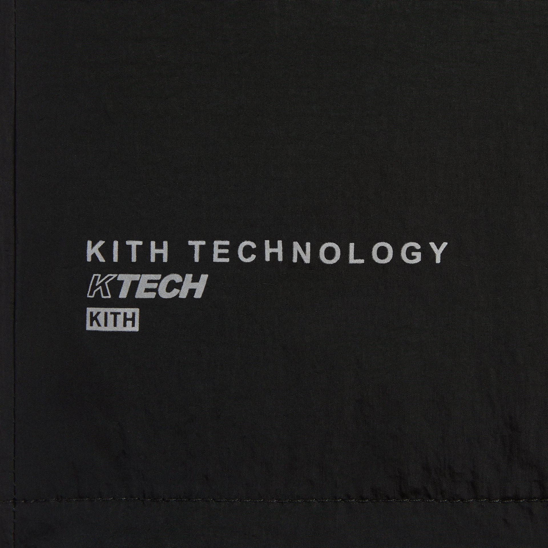 Close-up of the Kith Technology KTECH label on the interior of the Nylon Bolt shell jacket