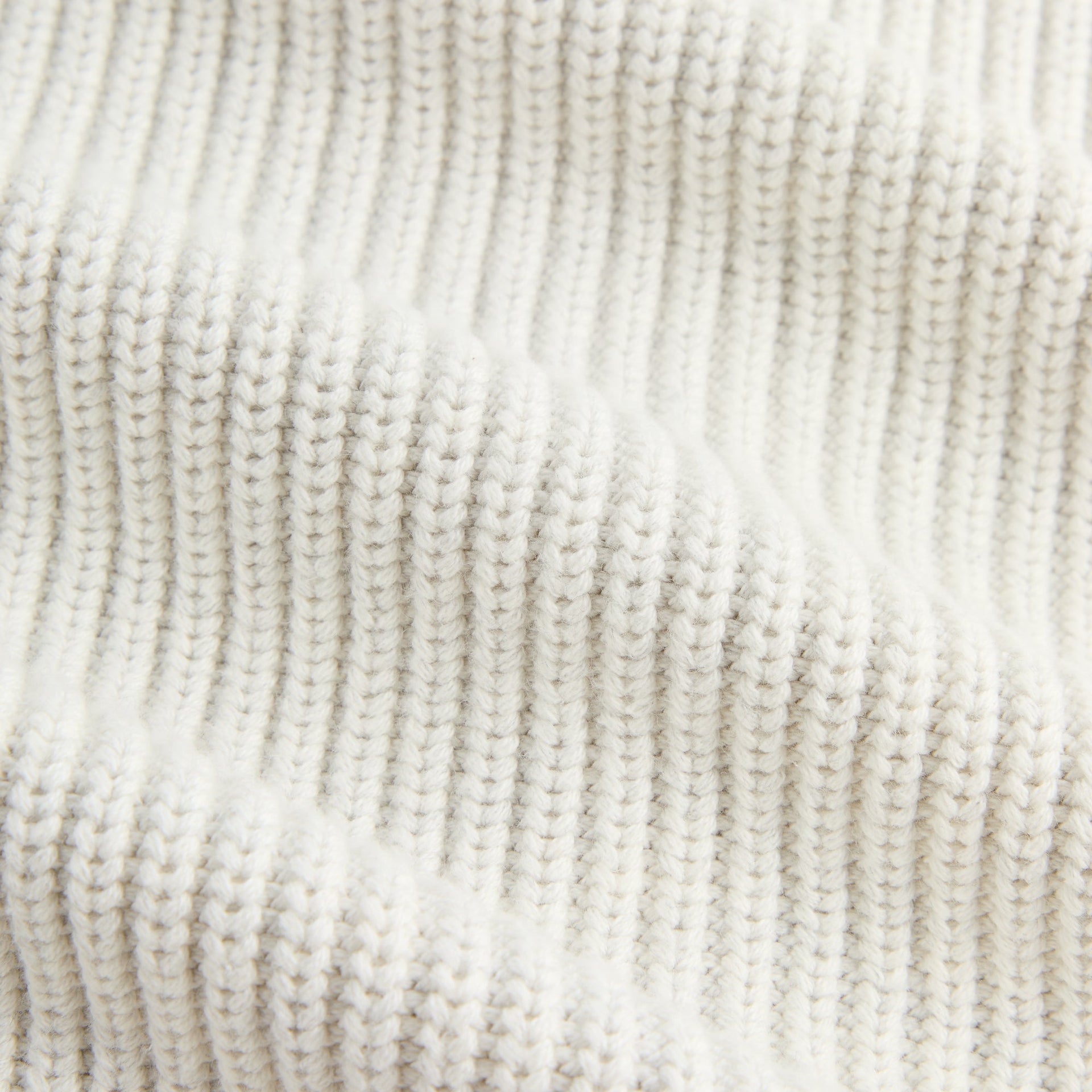 Close-up of the ribbed knit texture on the Kith Full Zip Knit Miles hoodie in light heather grey