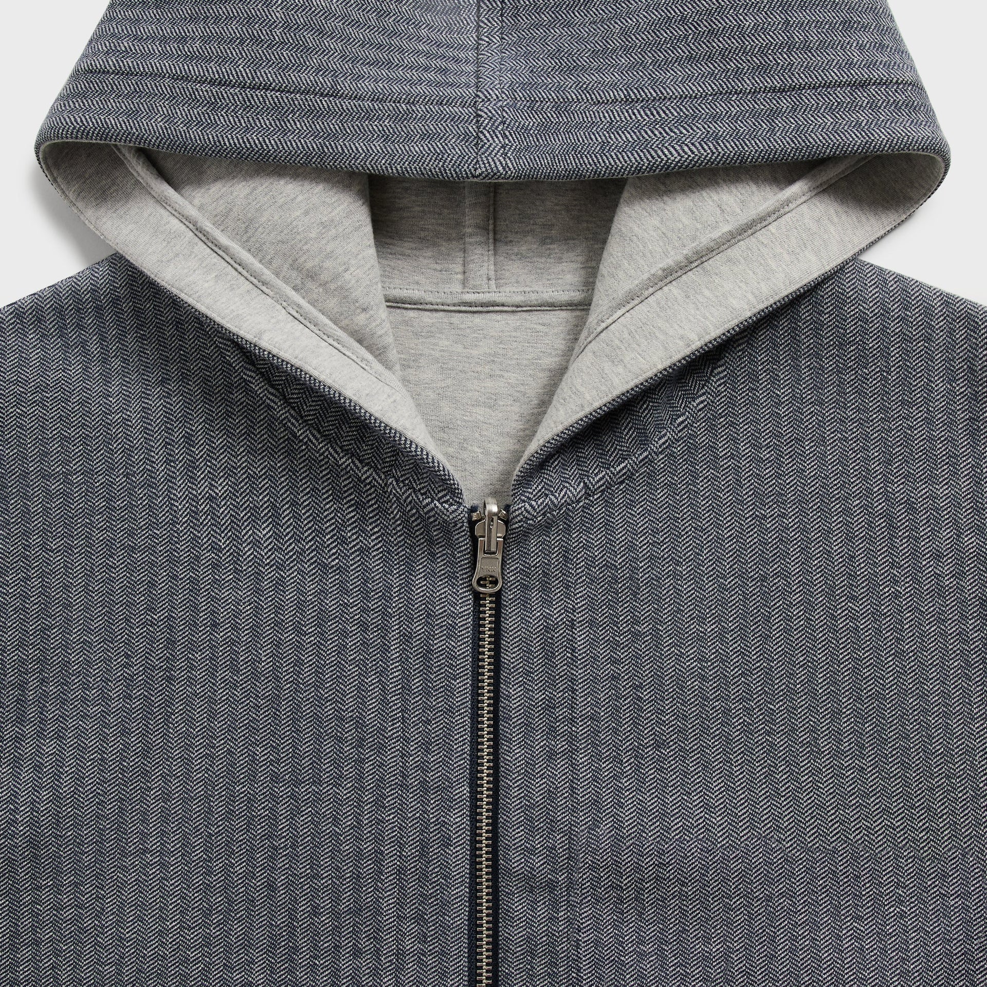&Kin Williams V hoodie detail: navy herringbone hood and collar with grey lining and YKK zip