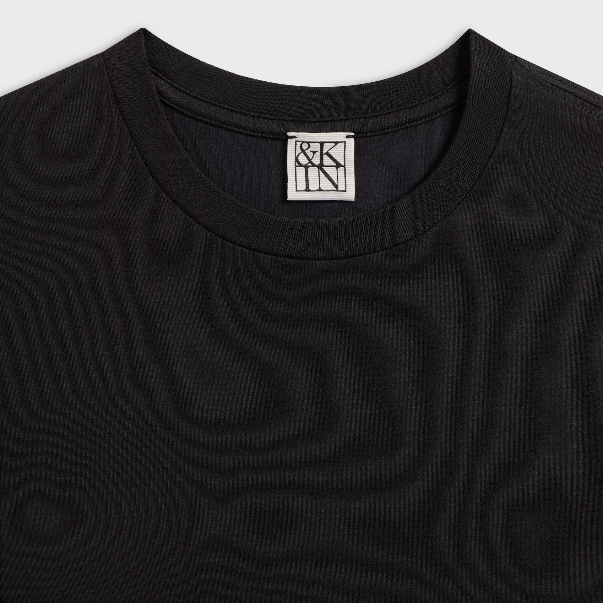 &Kin Long Sleeve Darin Tee neckline close-up with the woven &Kin box label