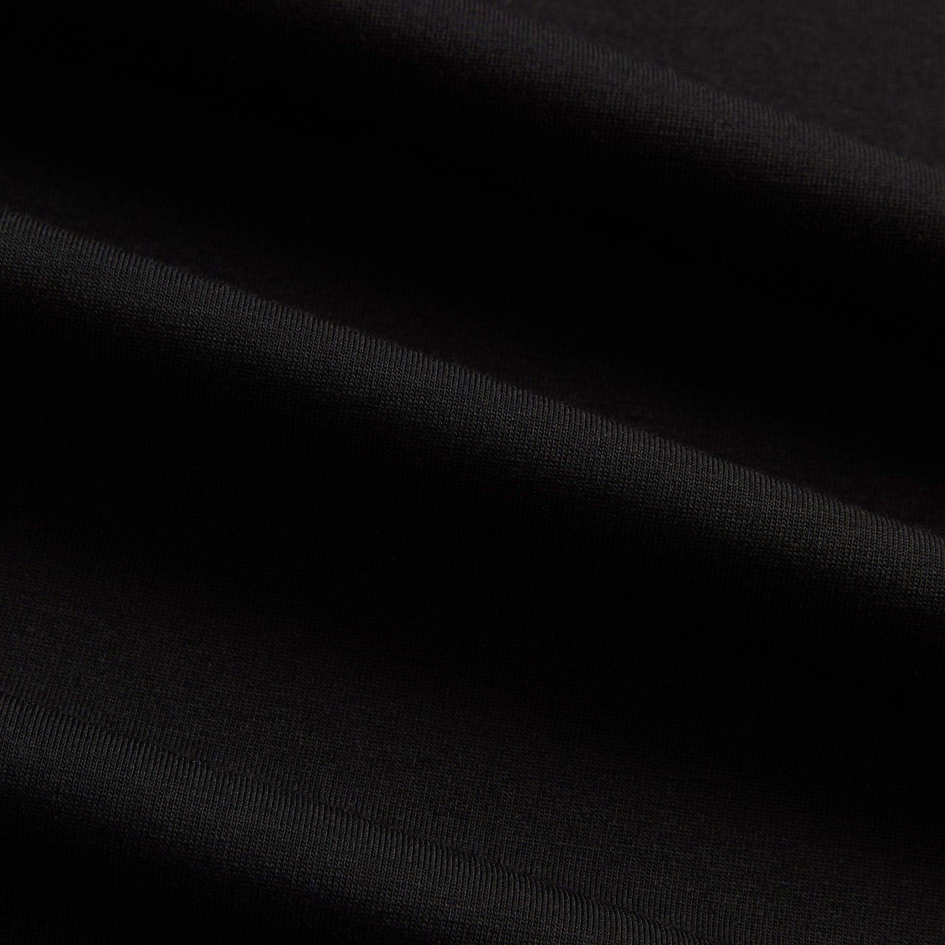 &Kin Albie Henley Tee close-up of the black cotton jersey fabric