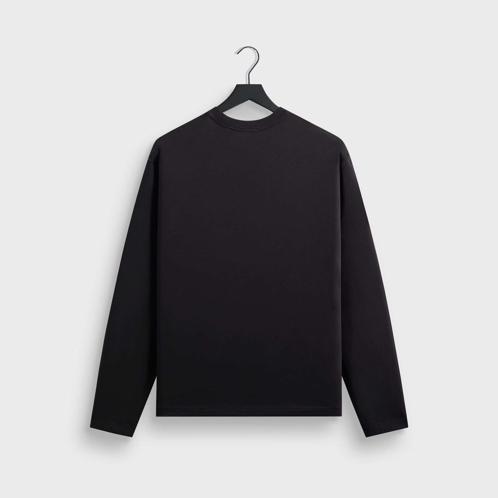 Kith Long Sleeve Alex boxy tee in black cotton, back flat lay on hanger