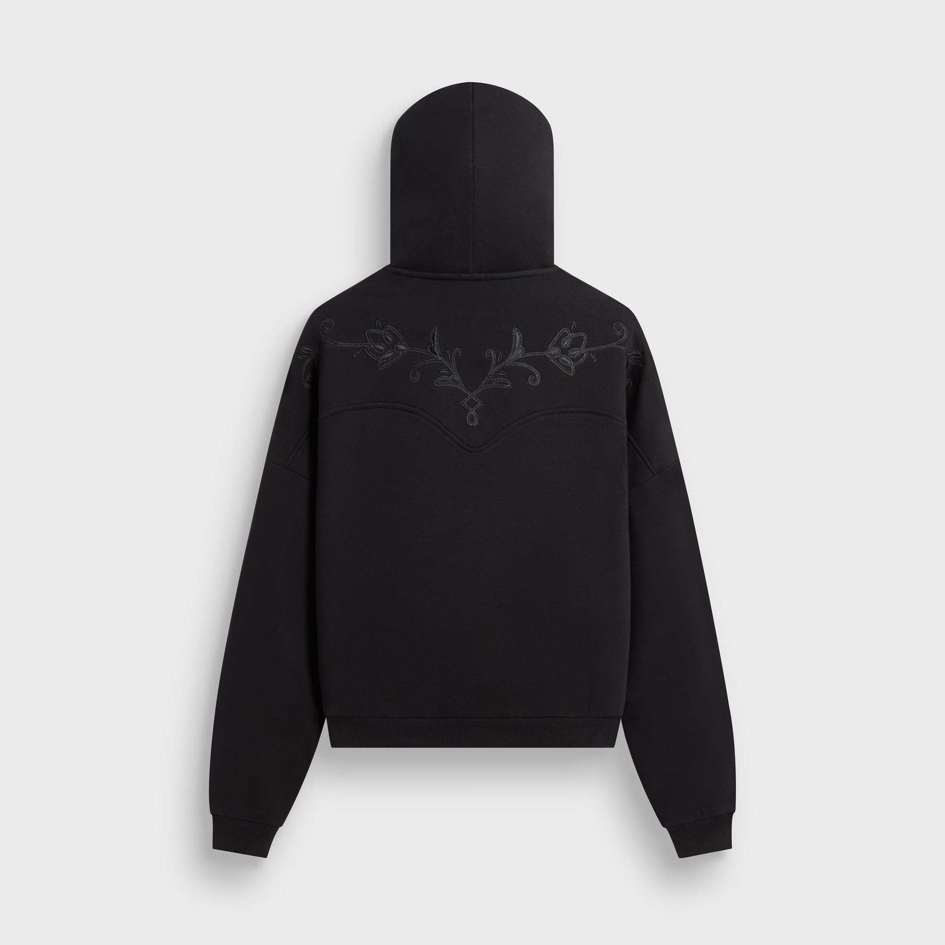 Kith Heritage Filigree Braxton hoodie in black, back flat lay with tonal floral filigree embroidery