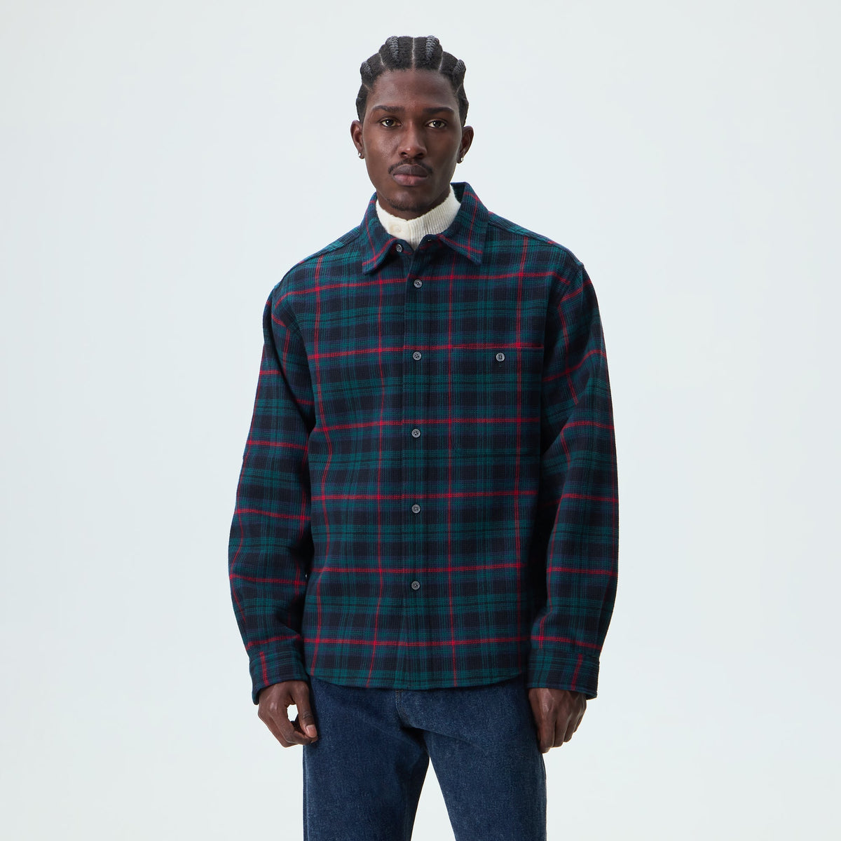 Kith Waffle Plaid Tomas Buttondown Shirt in black, on-model front view of green and red plaid over cream knit collar