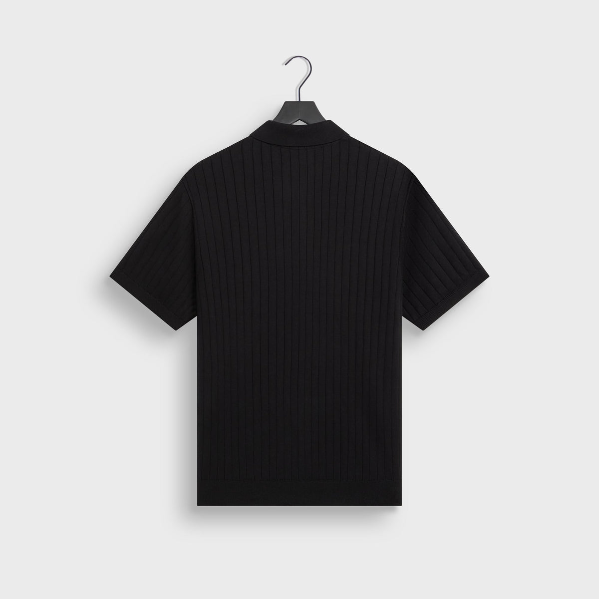 Kith Ivy Knit Tilden Polo in black ribbed knit, back flat lay on hanger