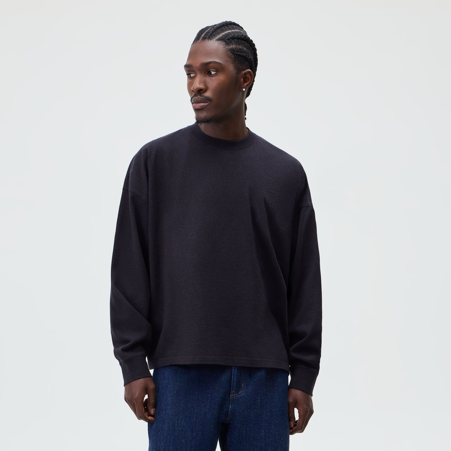 &Kin Long Sleeve Lawson Tee in washed black worn by a model with dark denim jeans, front view
