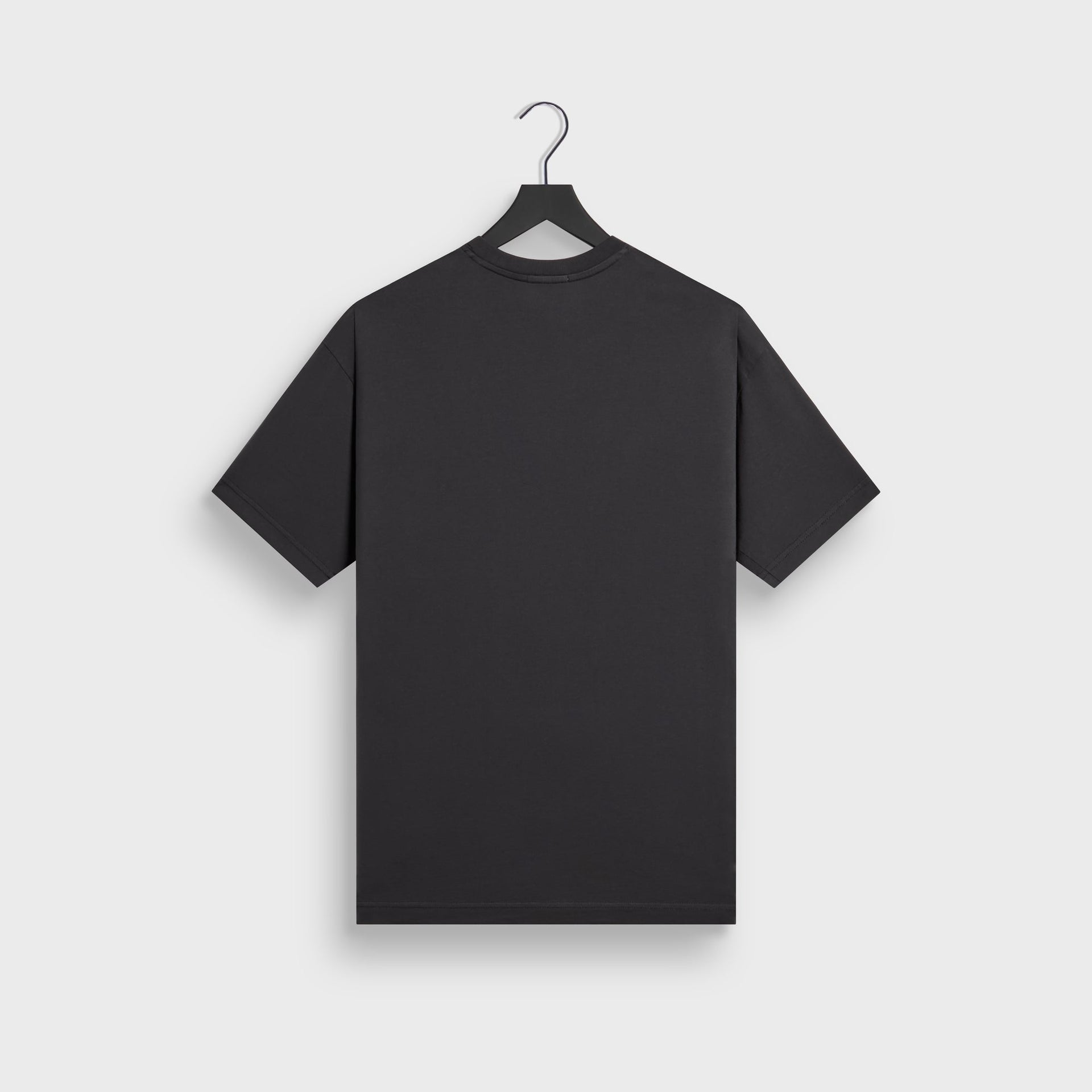 Kith LAX tee in black cotton, back flat lay on hanger
