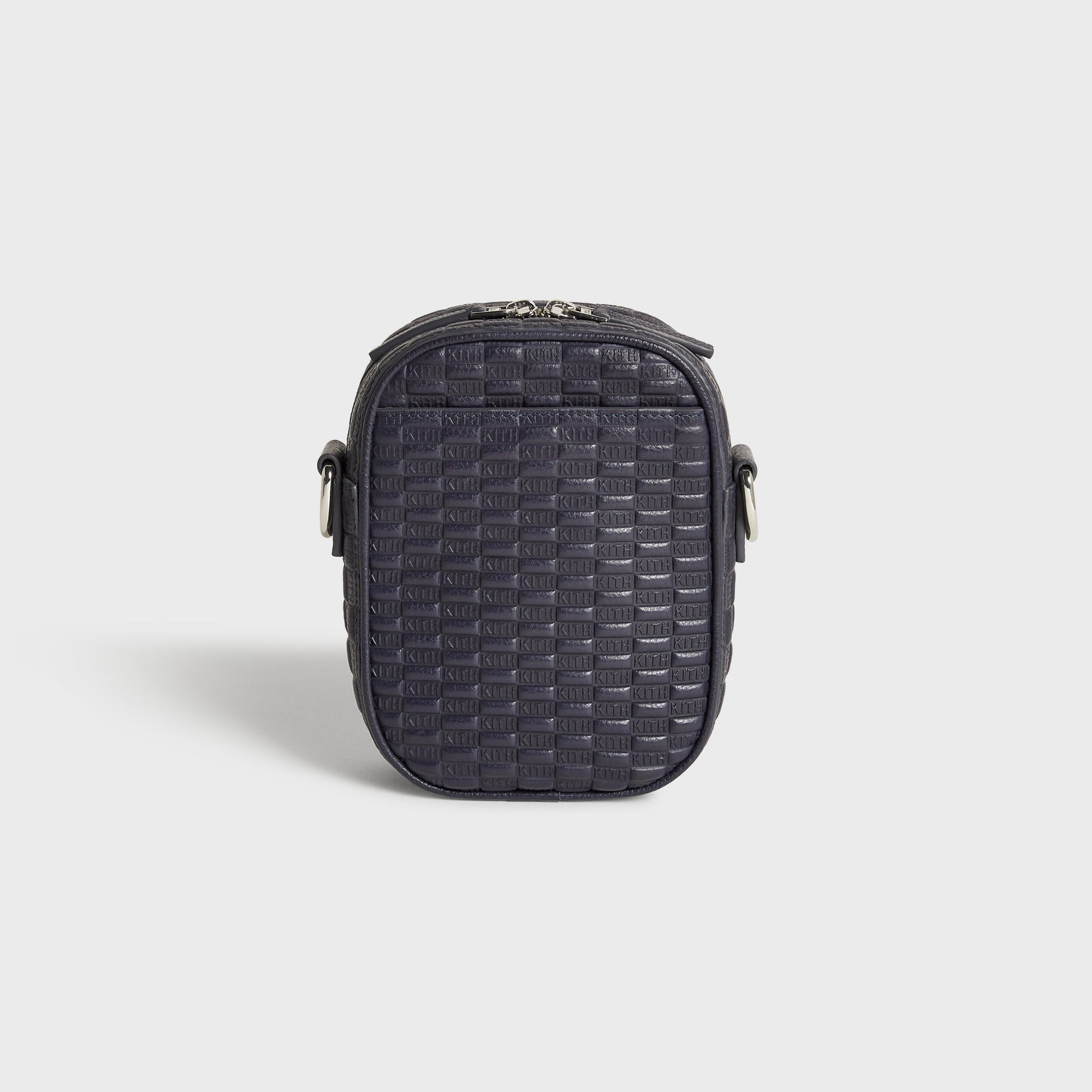 Kith Monogram Tumbled Leather Passenger K15 Bag in Ink, front view showing embossed Kith monogram leather