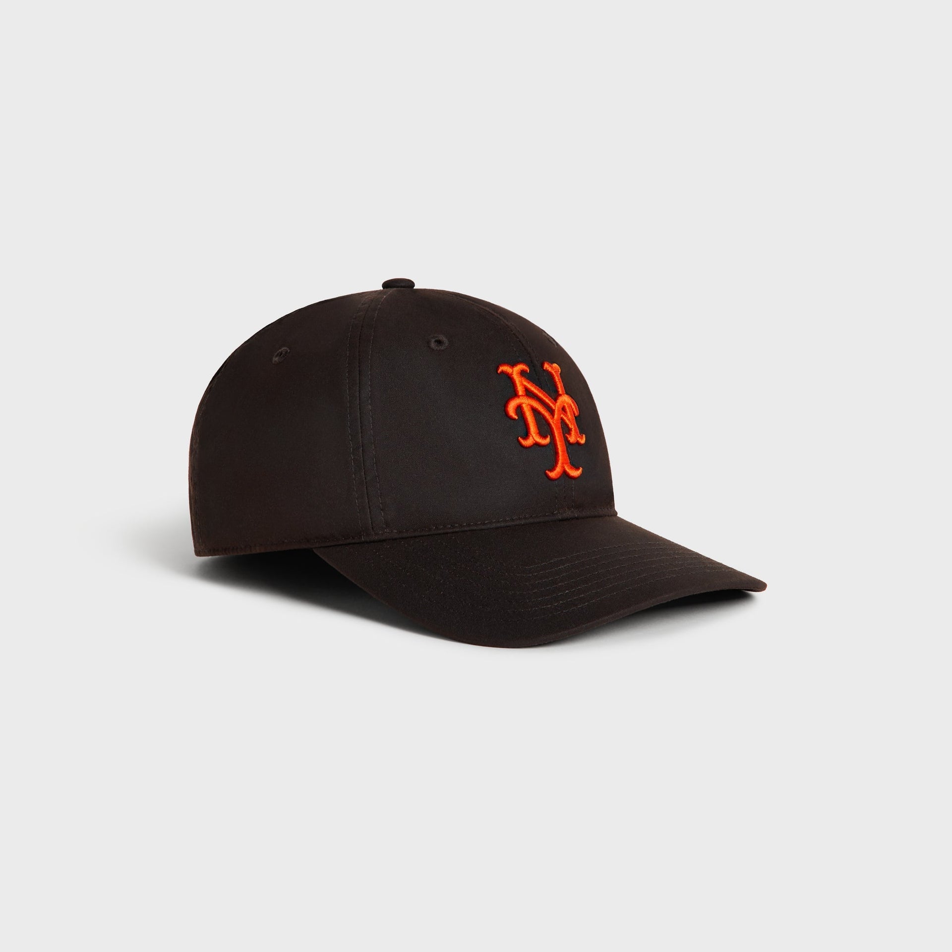 Kith & '47 Mets Waxed Cotton Franchise cap in kindling brown, angled view showing curved brim and orange NY logo