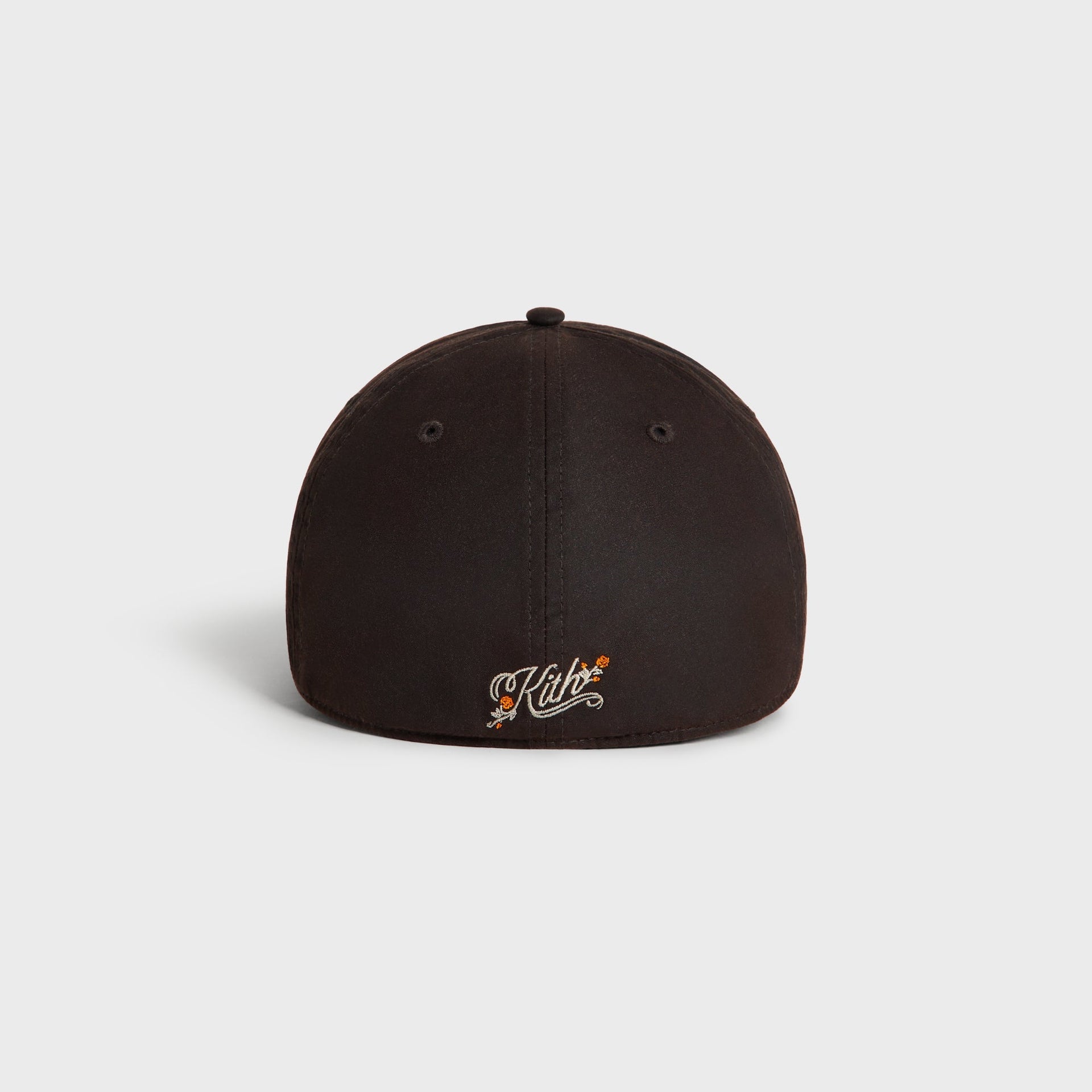 Rear of the kindling brown Kith & '47 Mets Franchise cap with cream Kith script logo and orange rose embroidery
