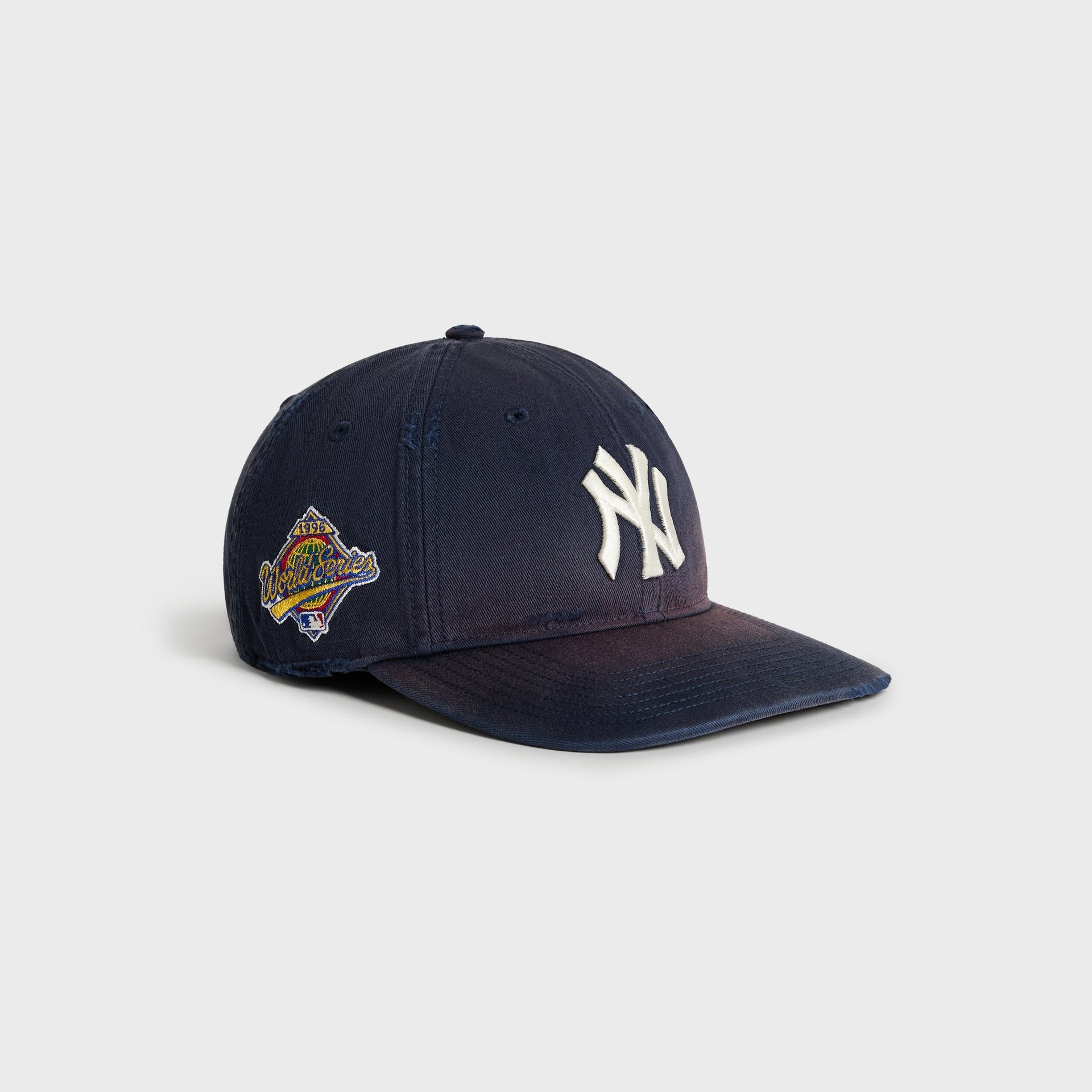 Kith & '47 Yankees cap in Nocturnal - 3/4 angle showing sun-faded gradient and 1996 World Series patch
