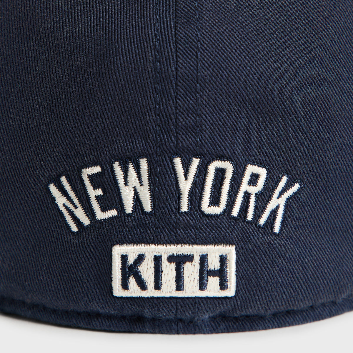 Kith & '47 Yankees cap in Nocturnal - close-up detail of New York KITH text on back