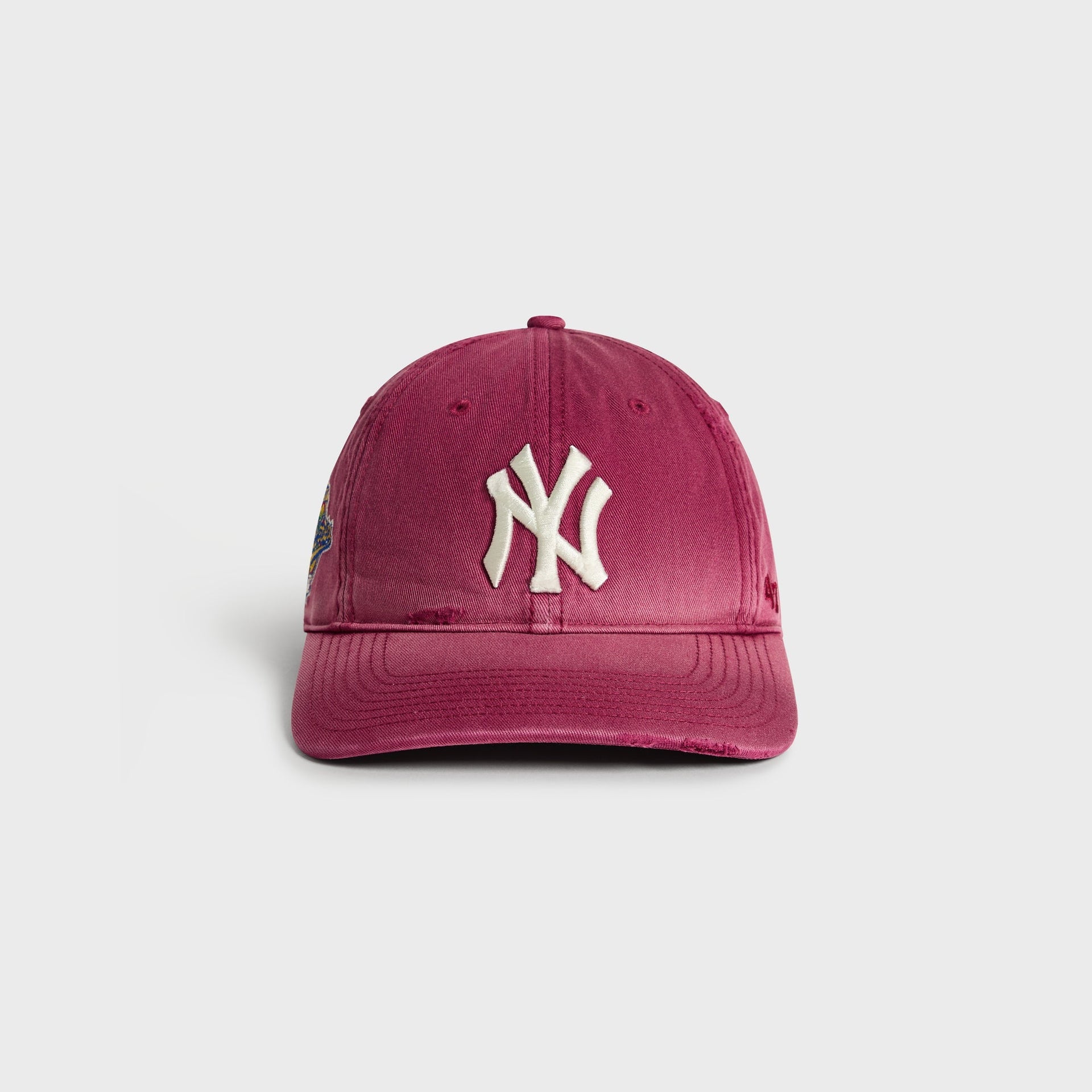 Kith & '47 Sun Faded Franchise LS Cap, Yankees, Garnet colorway - front view with embroidered NY logo