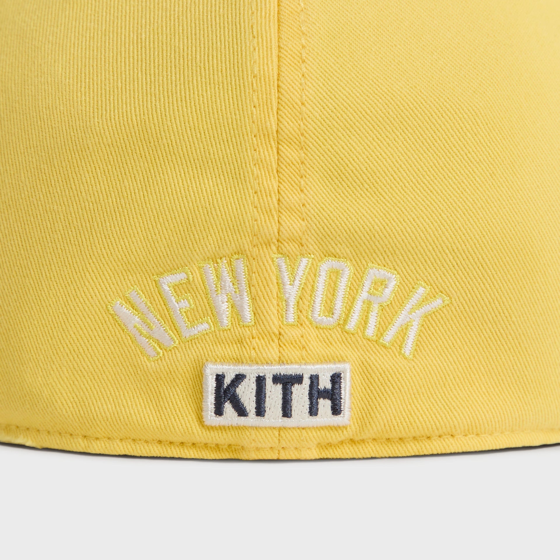 Close-up back detail of New York Kith text embroidery on Buzz Sun Faded Franchise LS Cap