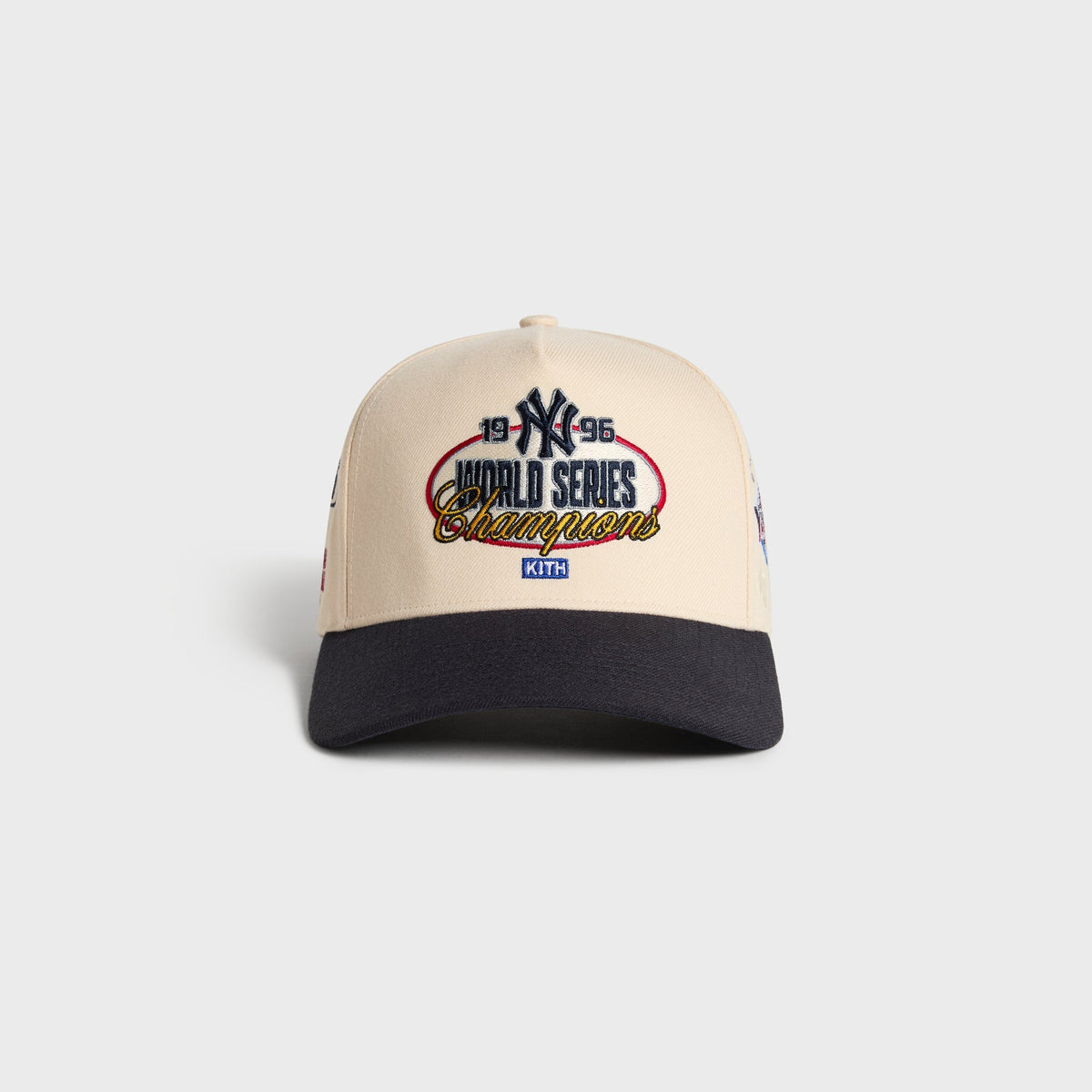 Kith & '47 Ballpark Offside DT Cap in Sandrift cream with navy brim, front view with 1996 World Series patch
