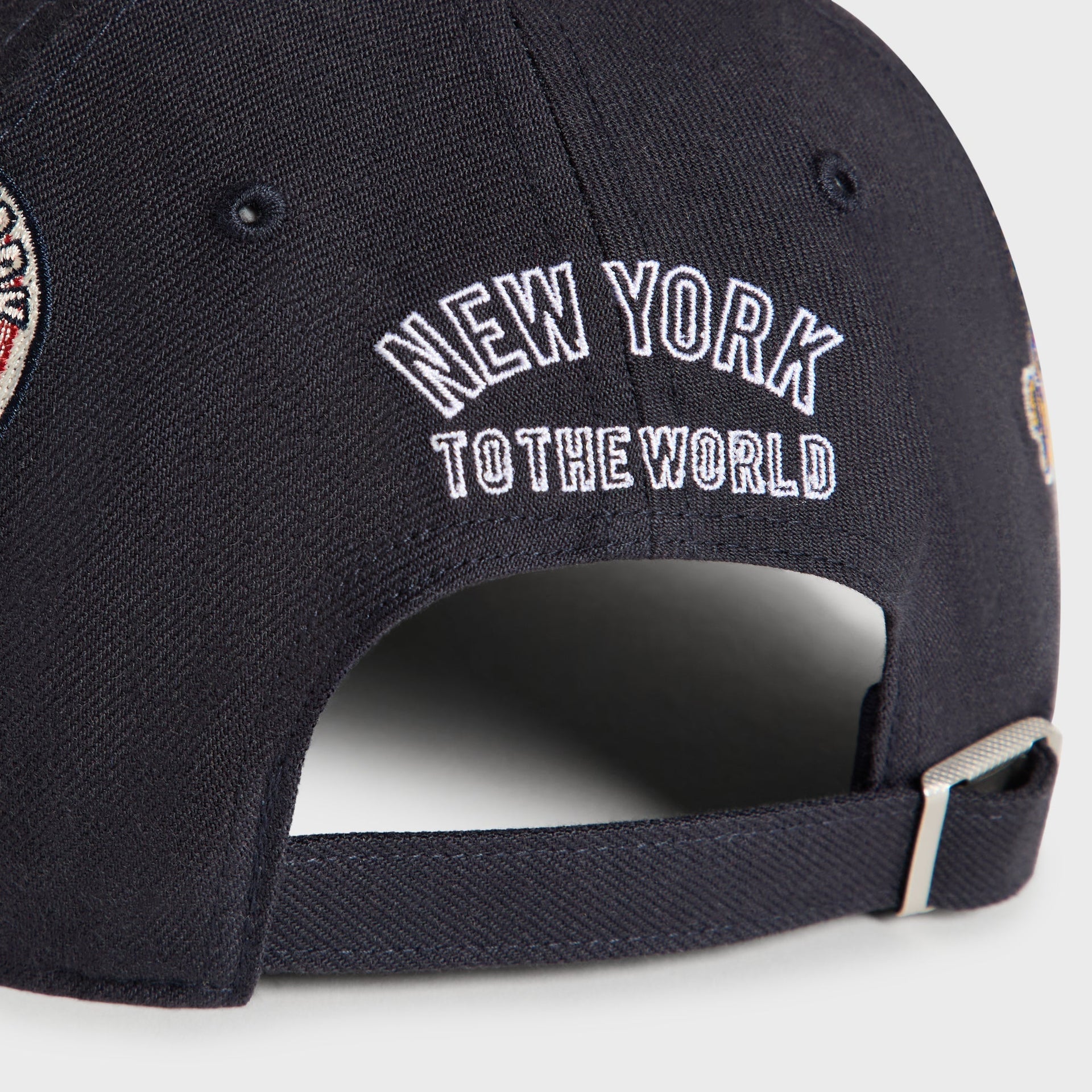 Close-up back detail of Nocturnal cap showing New York To The World embroidery