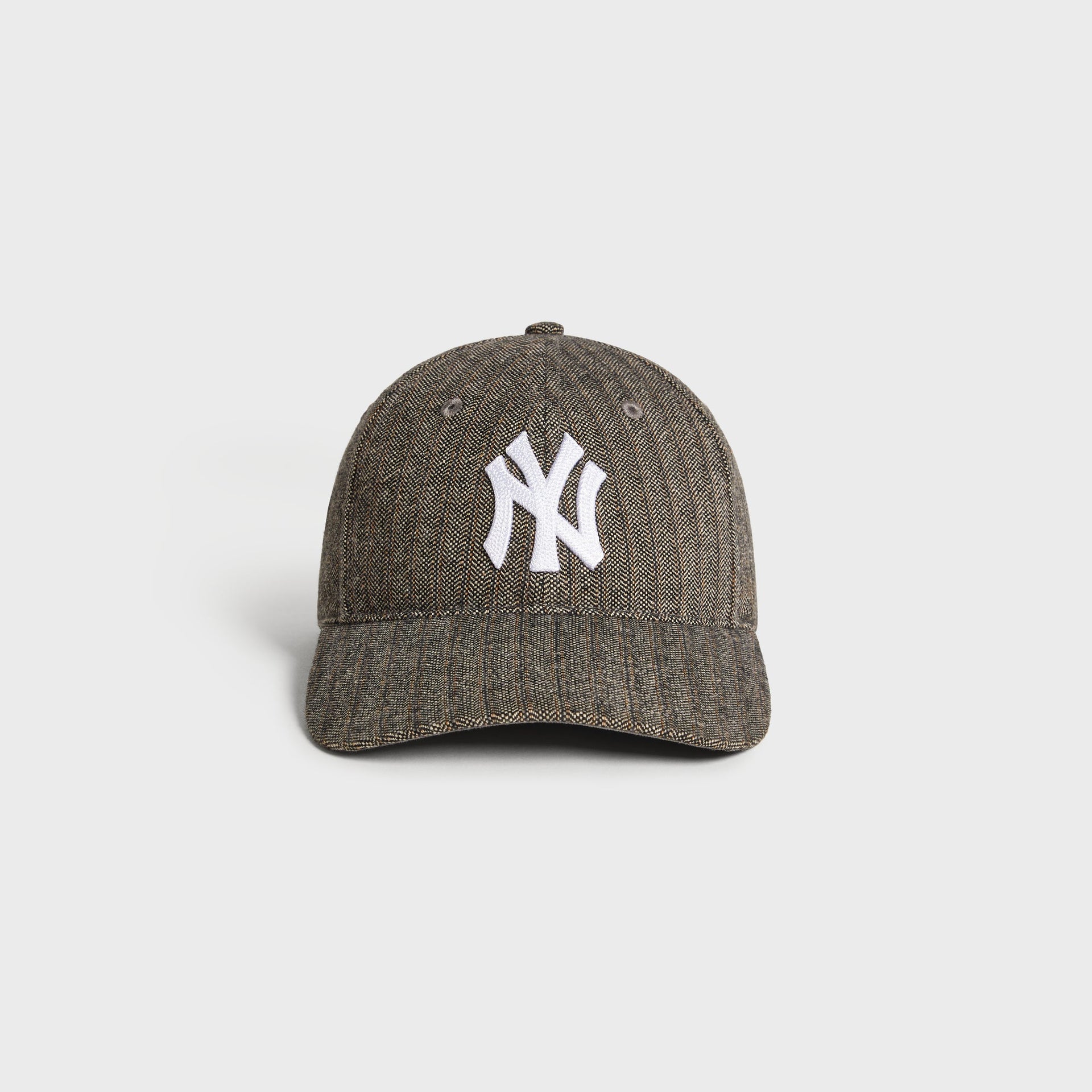 Kith & '47 New York Yankees Barre Stripe Franchise LS Cap in Apocalypse, front view with white NY logo