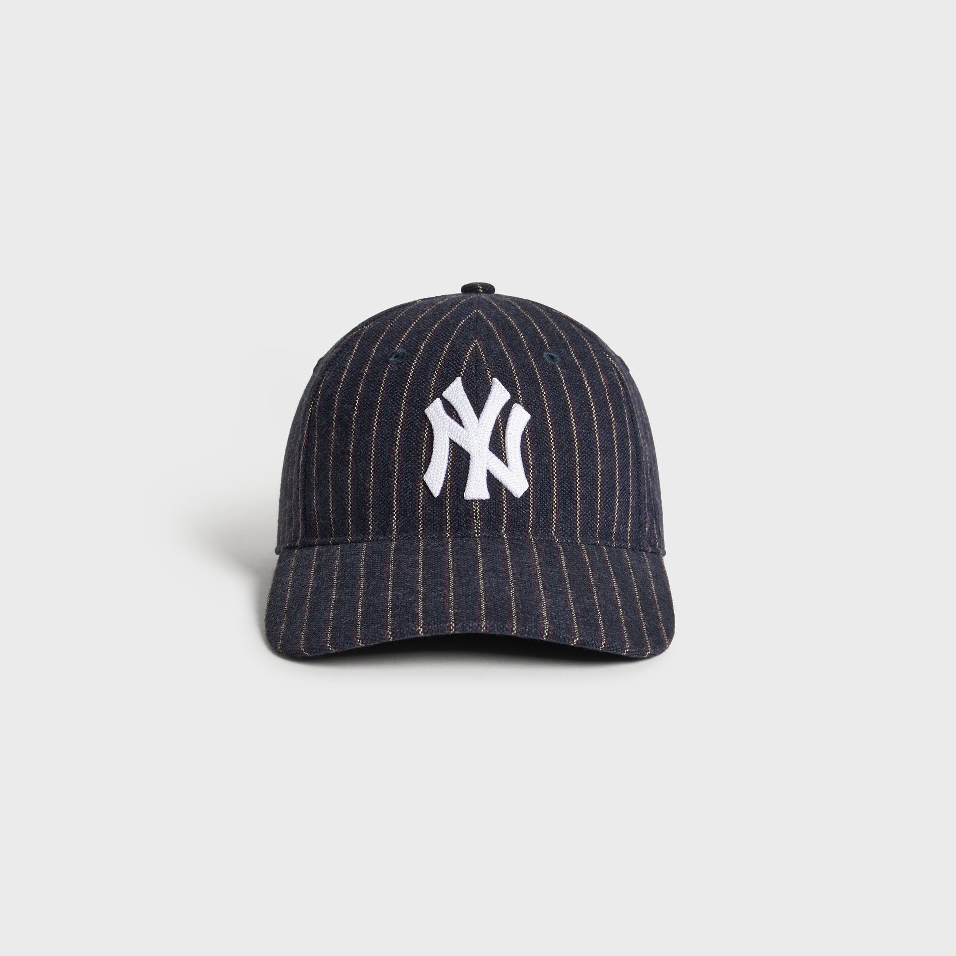 Kith & '47 Yankees Barre Stripe Franchise cap in Nocturnal navy pinstripe, front view with white NY logo