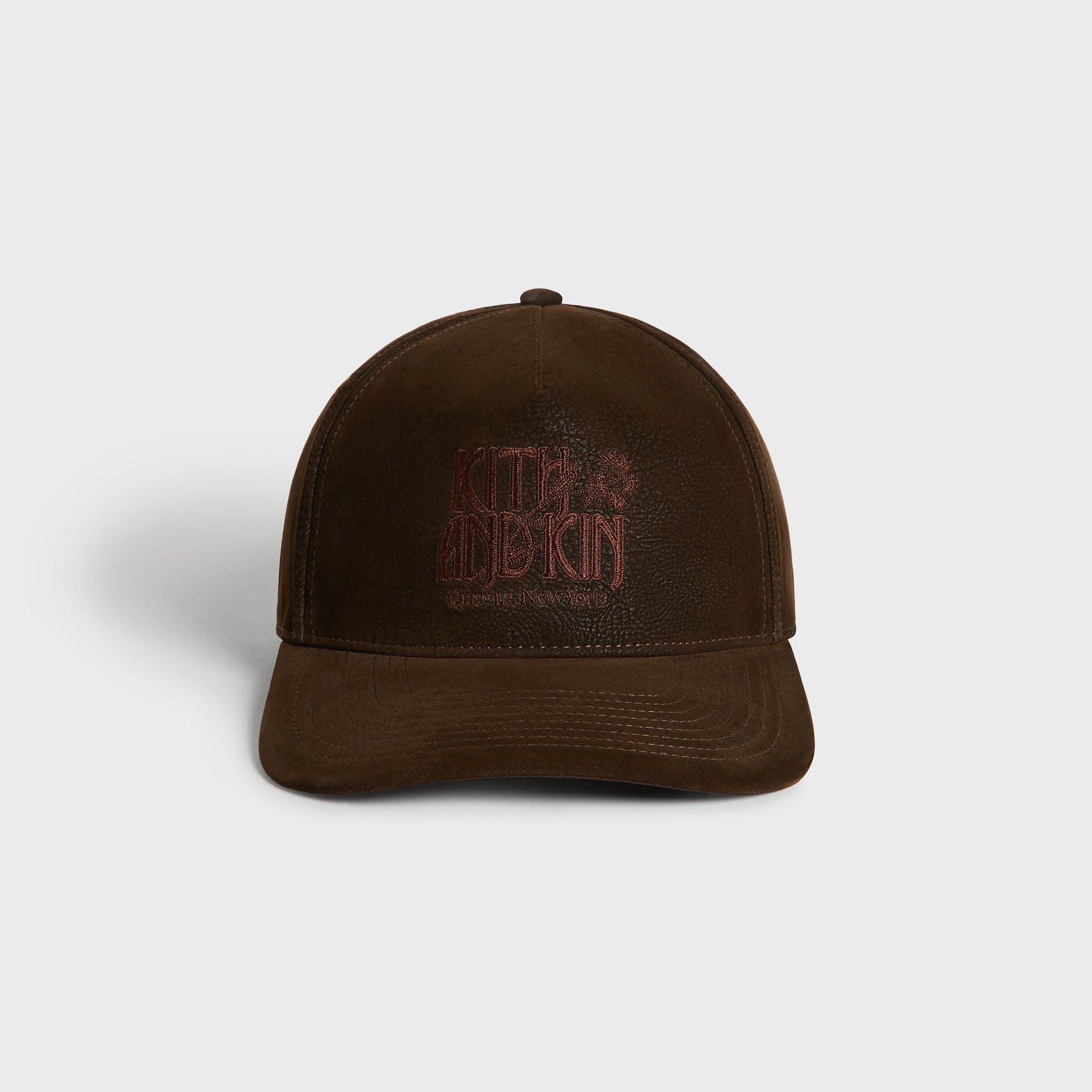 Kith Botanical Twill Bay Low Pinch Crown Cap in Clever, front view with brown suede crown and floral logo