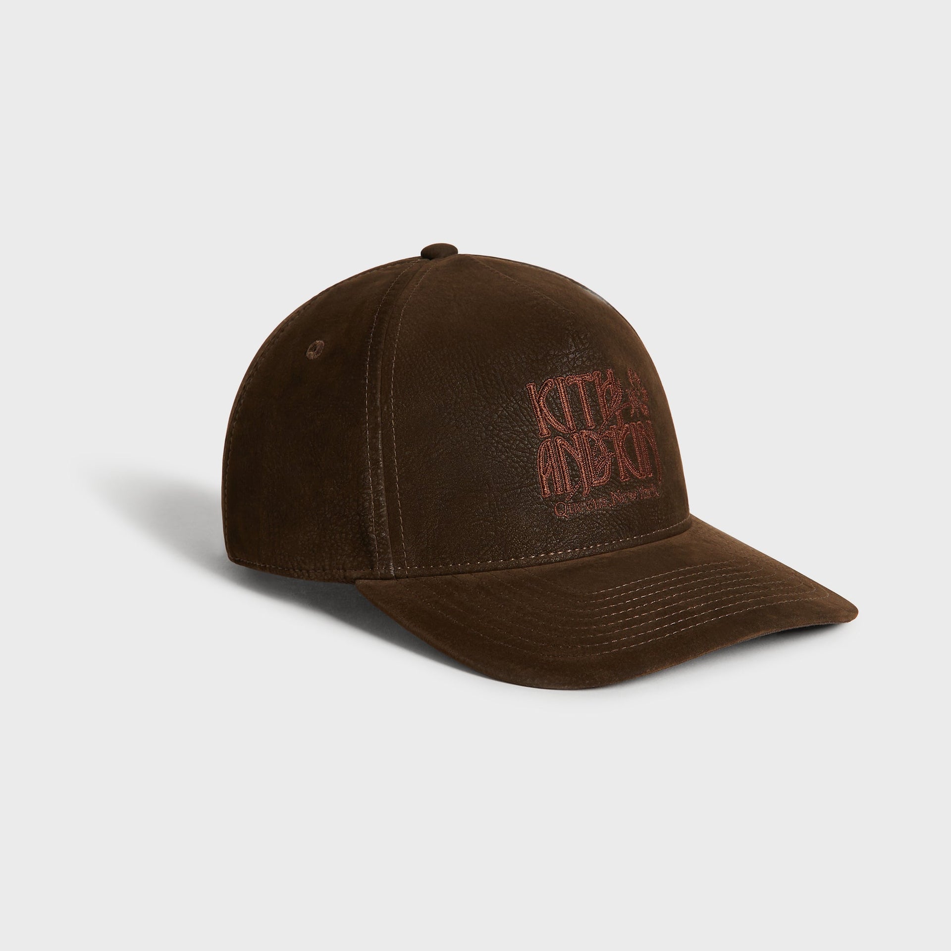 Kith Botanical Twill Bay Low Pinch Crown Cap in Clever, three-quarter side view of pinch crown and brim