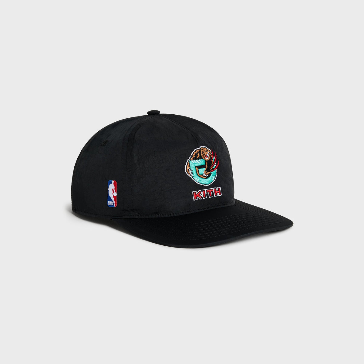 Kith & '47 Vancouver Grizzlies snapback cap in black, side view with Grizzlies bear logo, Kith wordmark and NBA logo patch