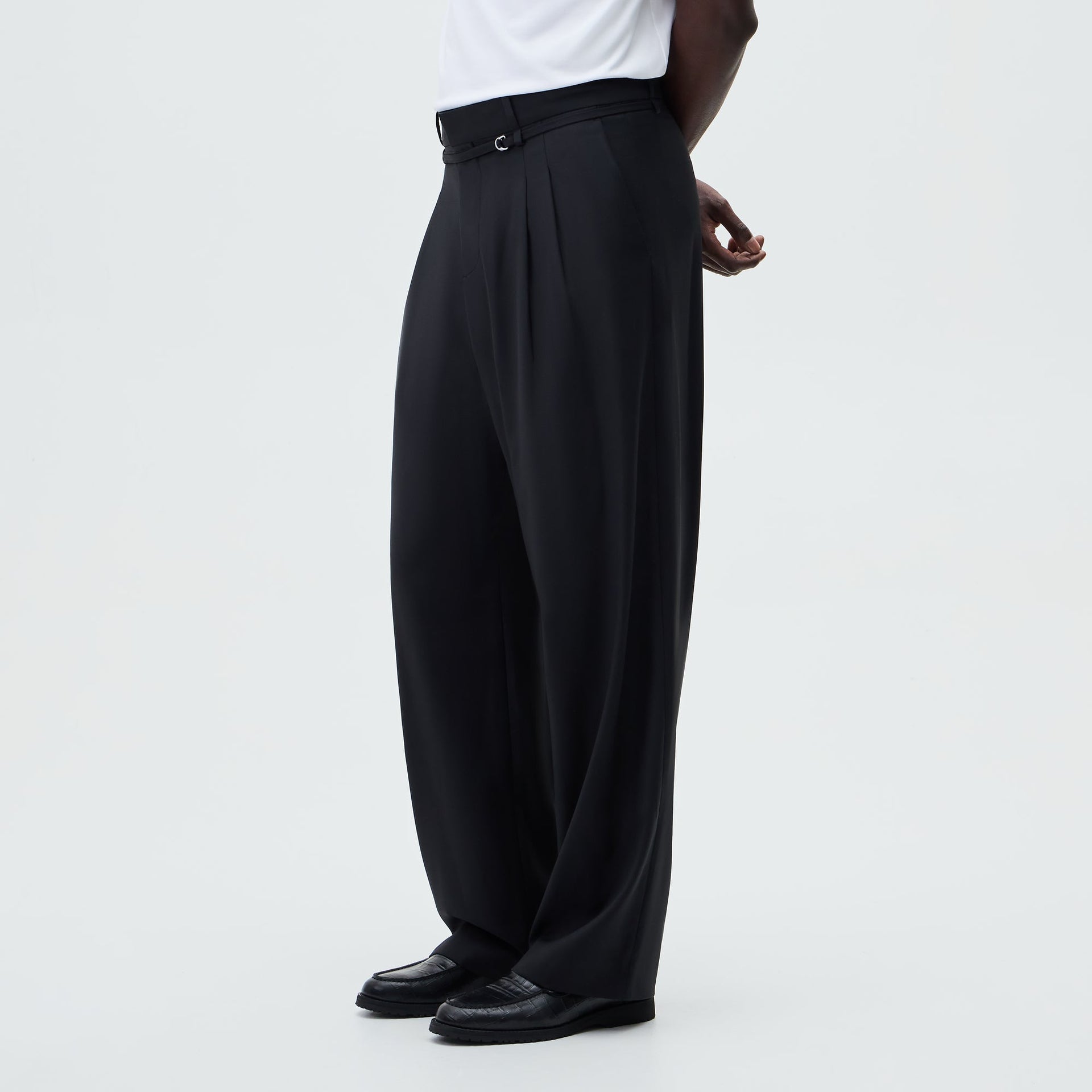 &Kin Tropical Wool Eli Pleated Trouser worn with a white tee, side view showing wide-leg drape and pleats