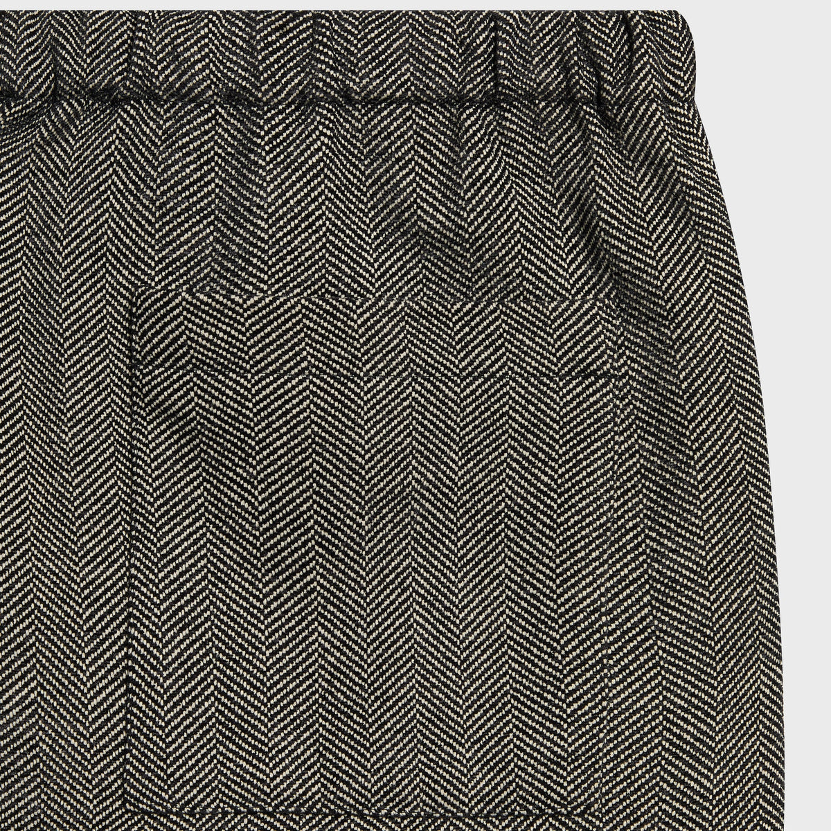 Close-up of the back patch pocket on the herringbone Kith Grayson pant
