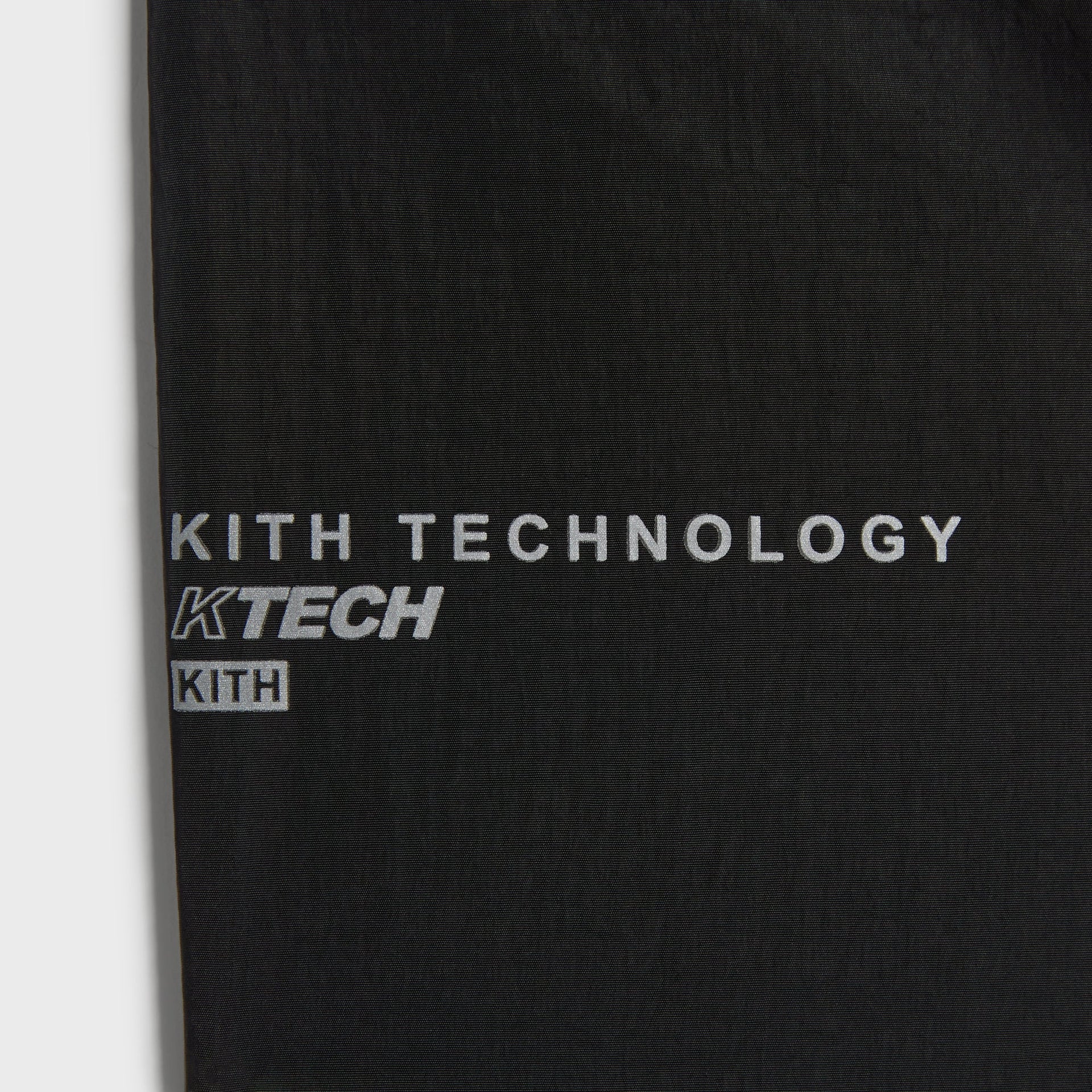 Close-up of the Kith Technology KTECH label on the interior of the Nylon Bolt pant