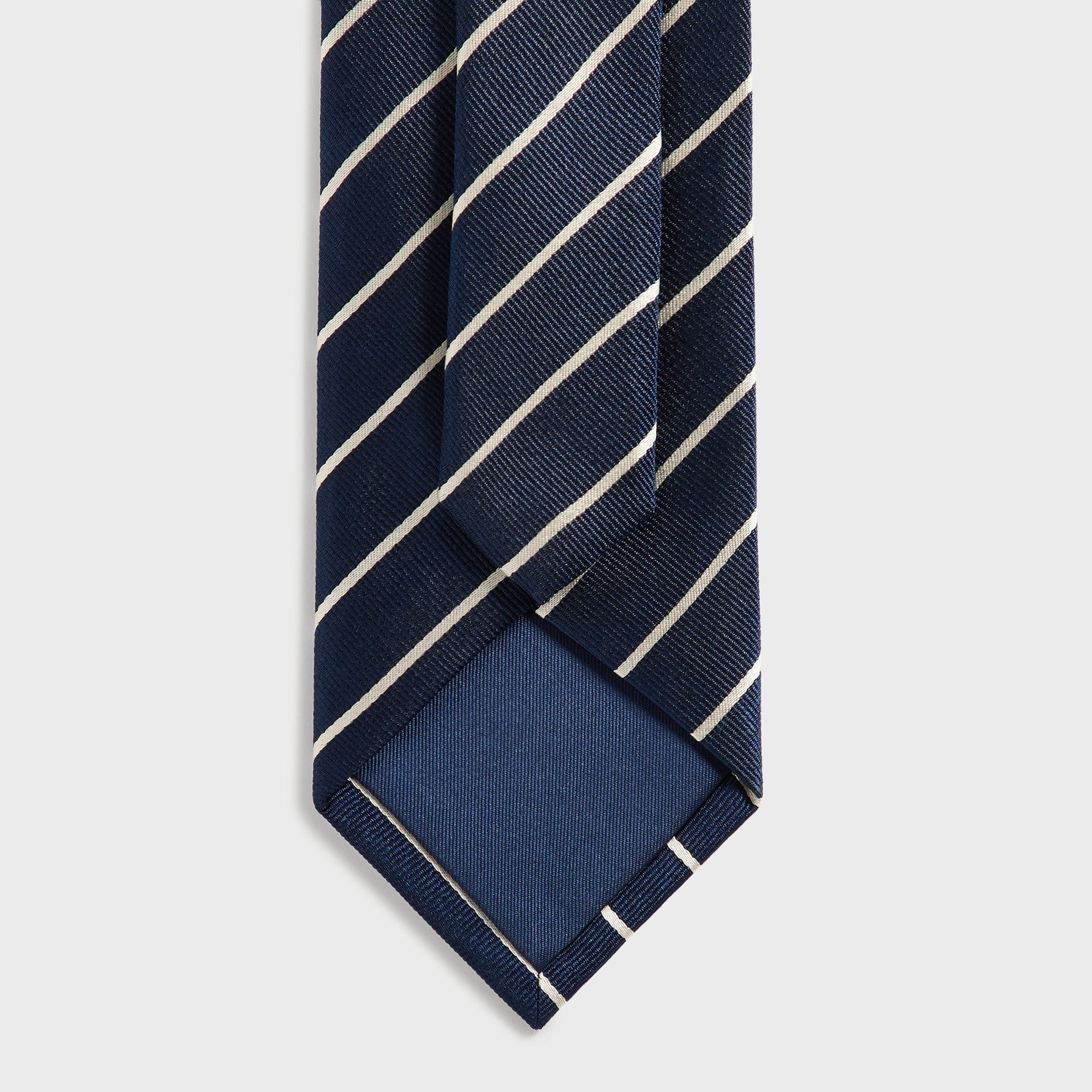 Kith x New York Yankees Nocturnal tie tip flipped up showing solid navy back lining