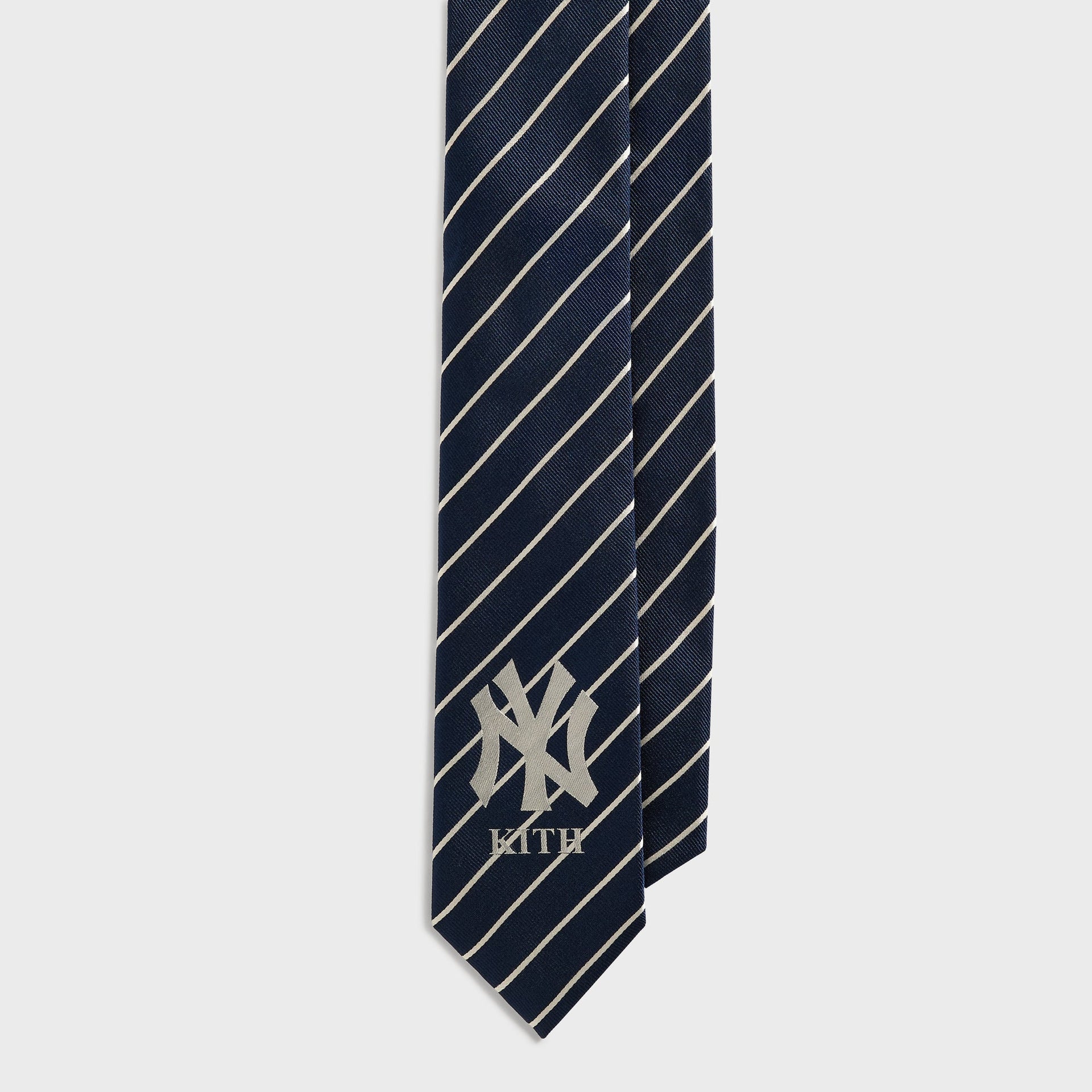 Kith x New York Yankees Nocturnal tie, close-up of both hanging tails with NY Kith logo