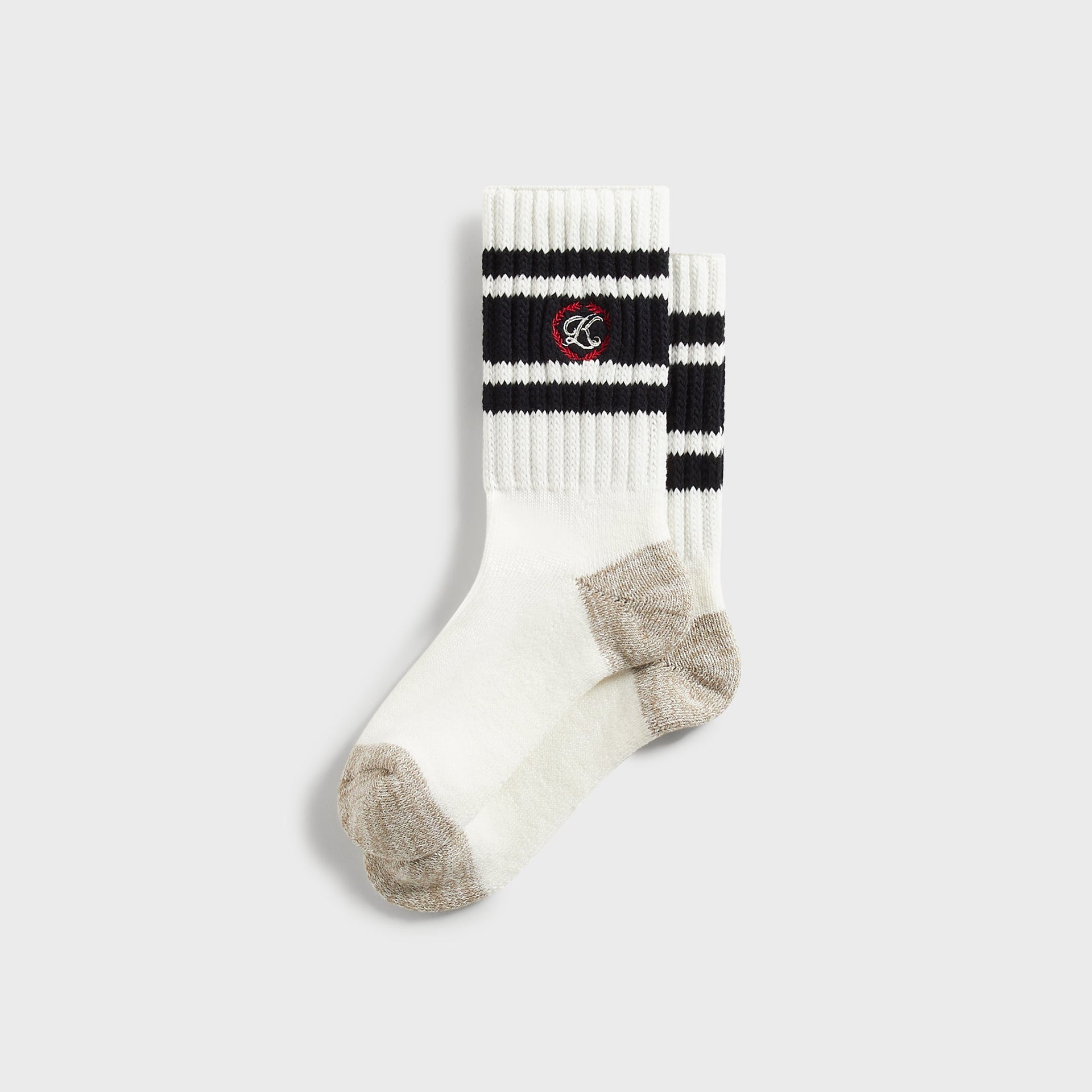 Kith Script K Laurel Stripe Cotton Chunky Crew Socks in White, flat lay pair with navy stripes and embroidered laurel logo