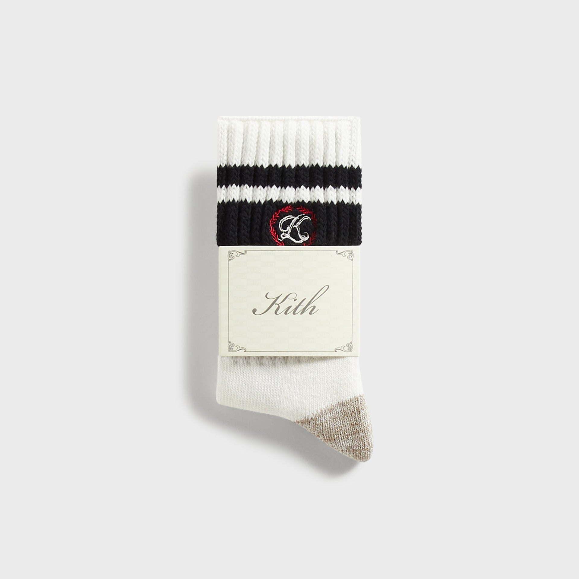 Kith Script K Laurel Stripe Cotton Chunky Crew Socks in White, folded sock shown with Kith branded paper tag
