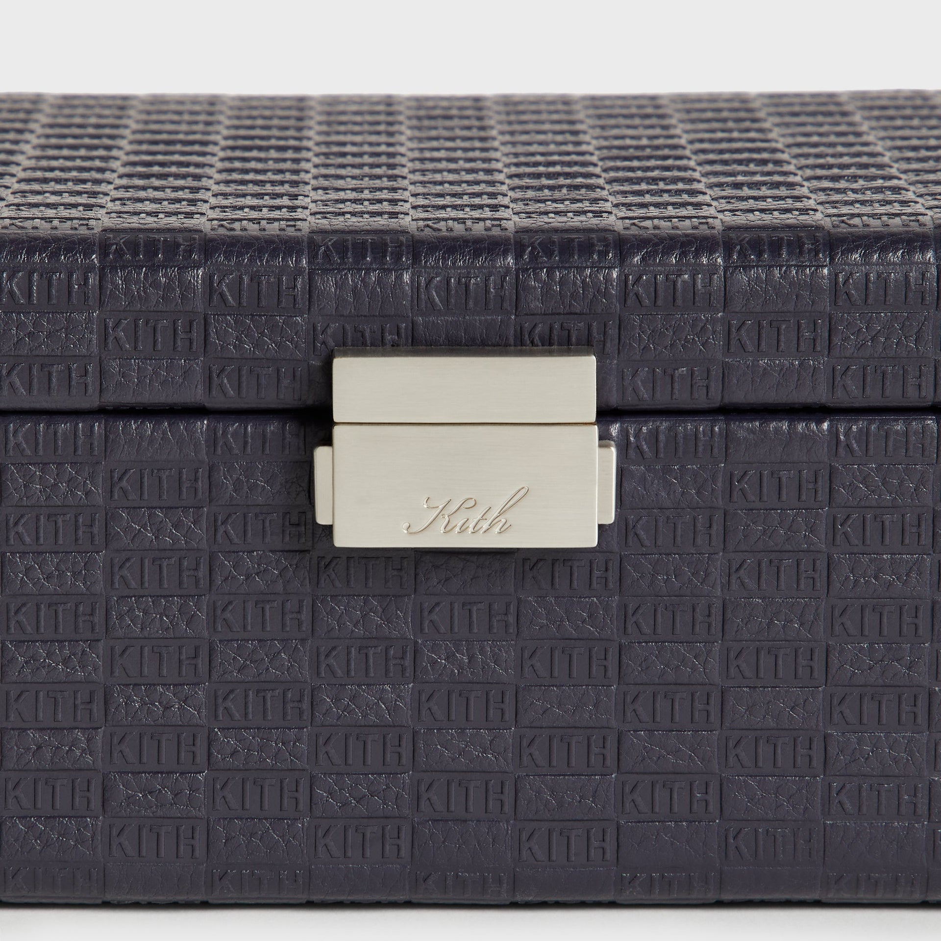 Close-up of front metal clasp with engraved Kith script on Watch Box in Ink leather