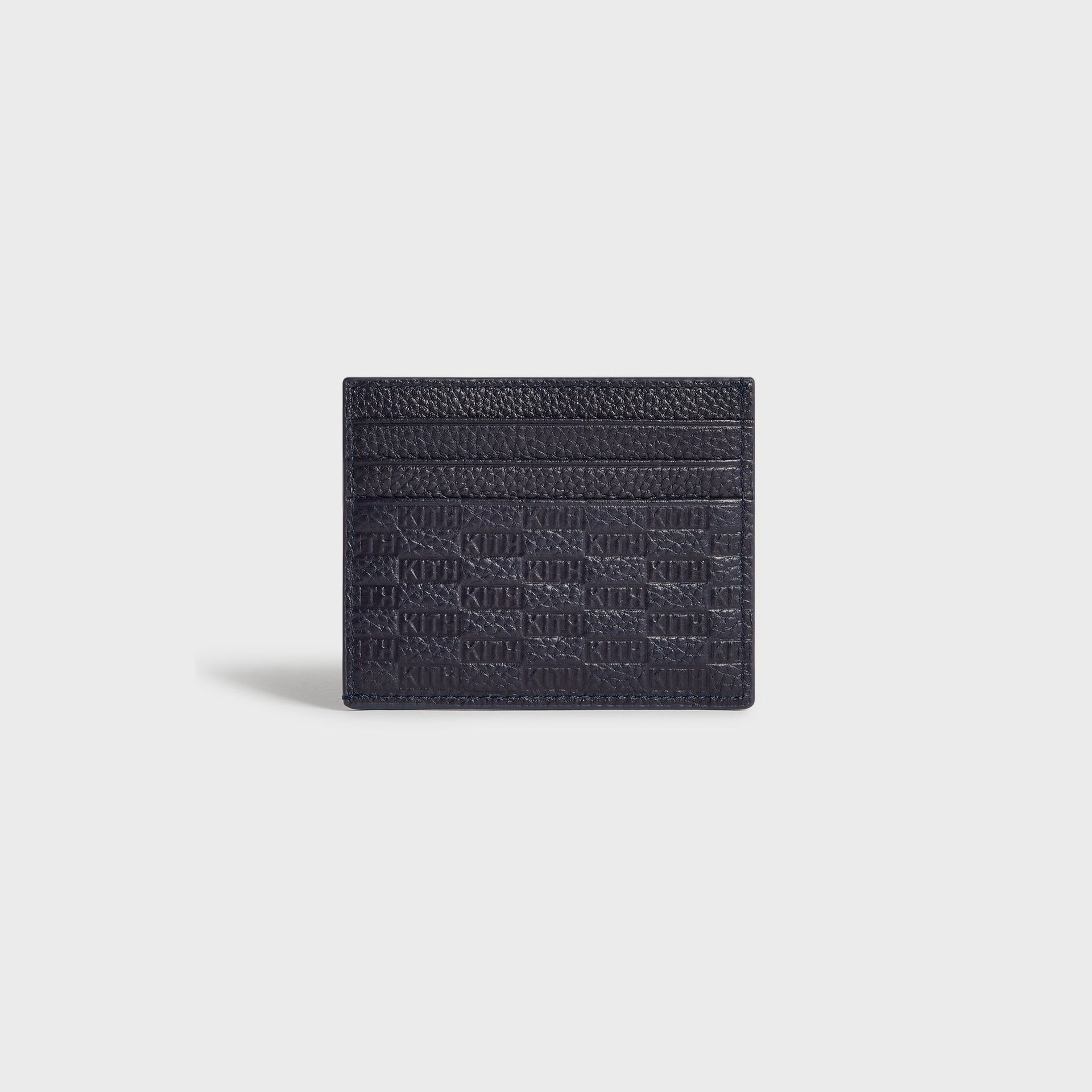Kith Monogram Tumbled Leather Card Holder in Ink, front view showing card slots and embossed monogram