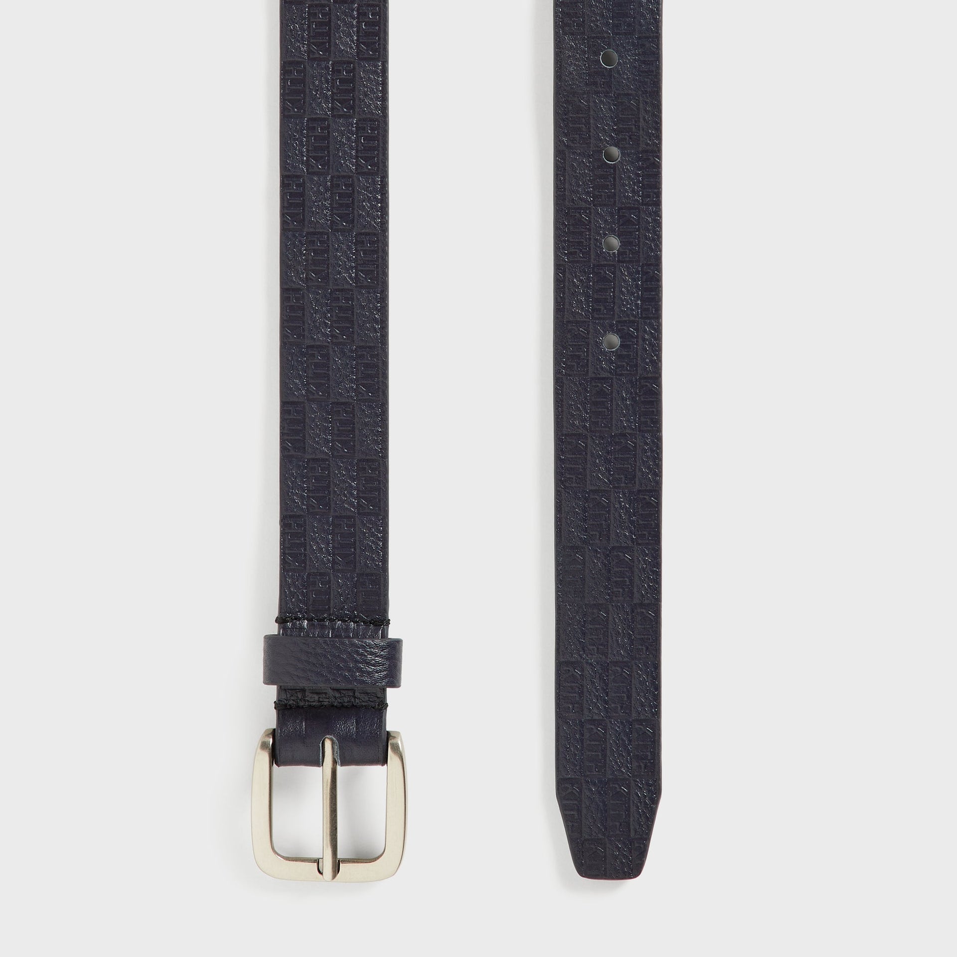 Kith Monogram Tumbled Leather Belt in Ink, flat-lay of both strap ends showing pattern and buckle holes