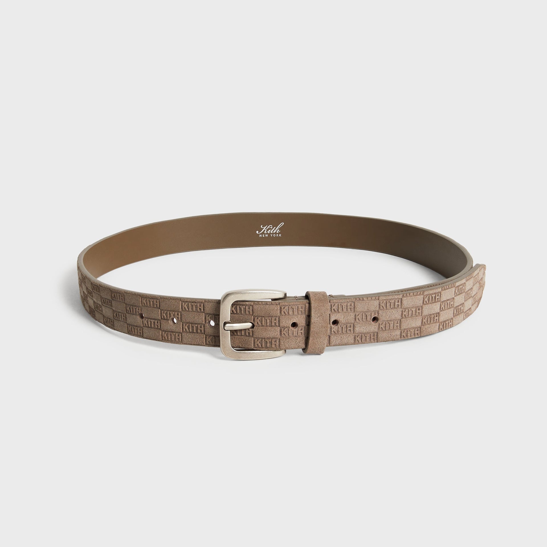 Kith Monogram Suede Belt in Java, front view with brushed silver buckle and embossed KITH pattern strap