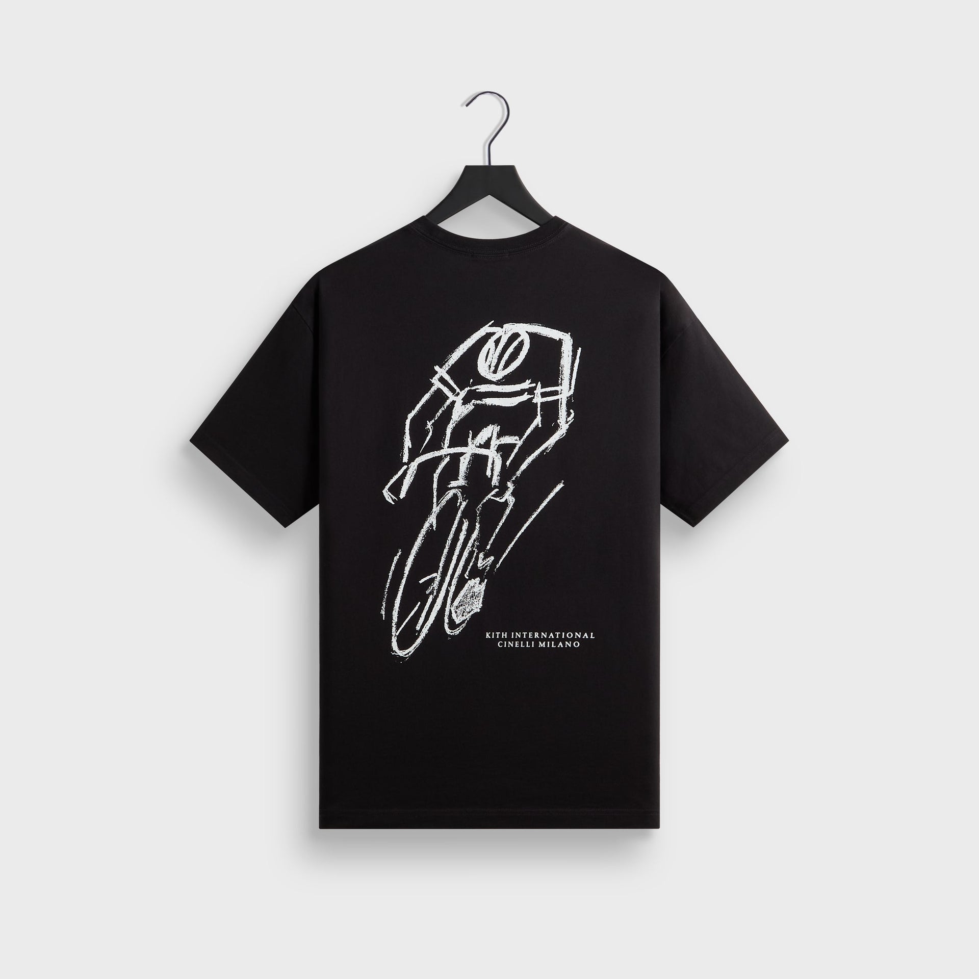 Kith for Cinelli Ciclismo Tee in black, back view on hanger with white sketched cyclist graphic and Cinelli Milano text