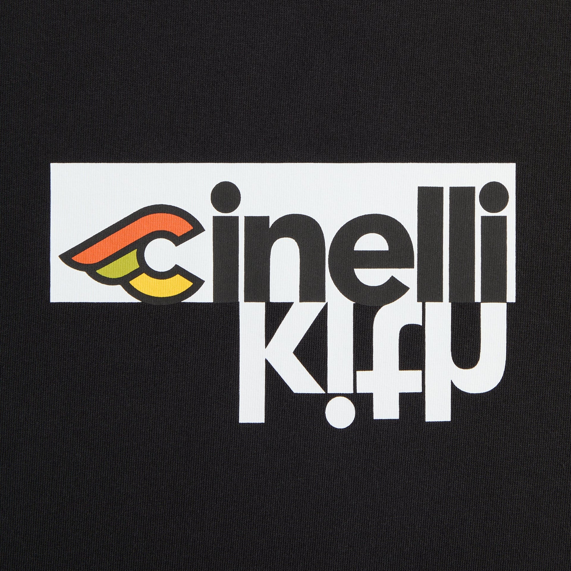 Kith for Cinelli Upside Down Tee in black, close-up of chest graphic: Cinelli winged C logo above upside-down Kith wordmark.